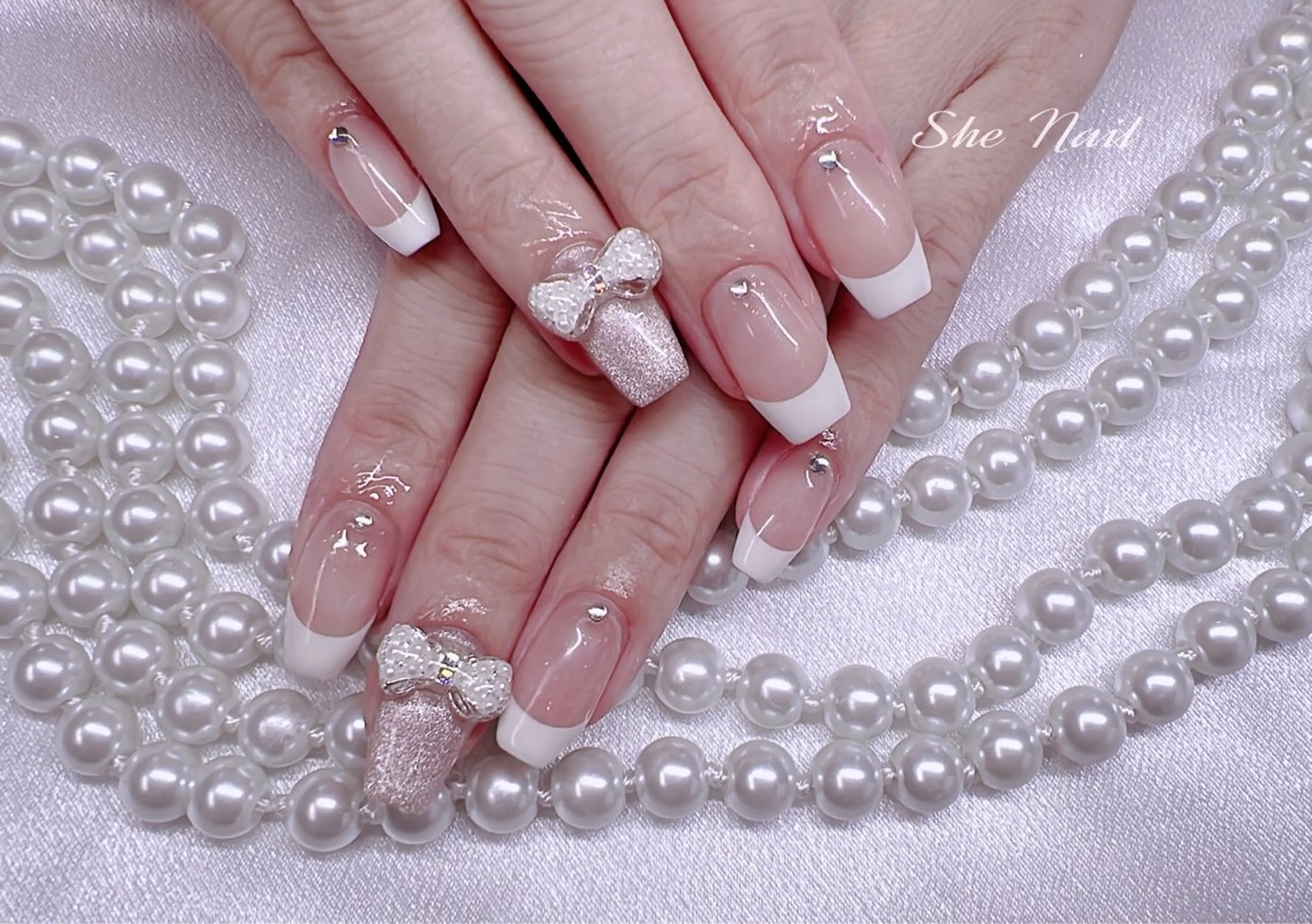 ネイル チークネイル 長さ出し フレンチネイル ハート キラキラネイル ハンドネイル She   Nail所属・ISA_ BELLAのネイルデザイン