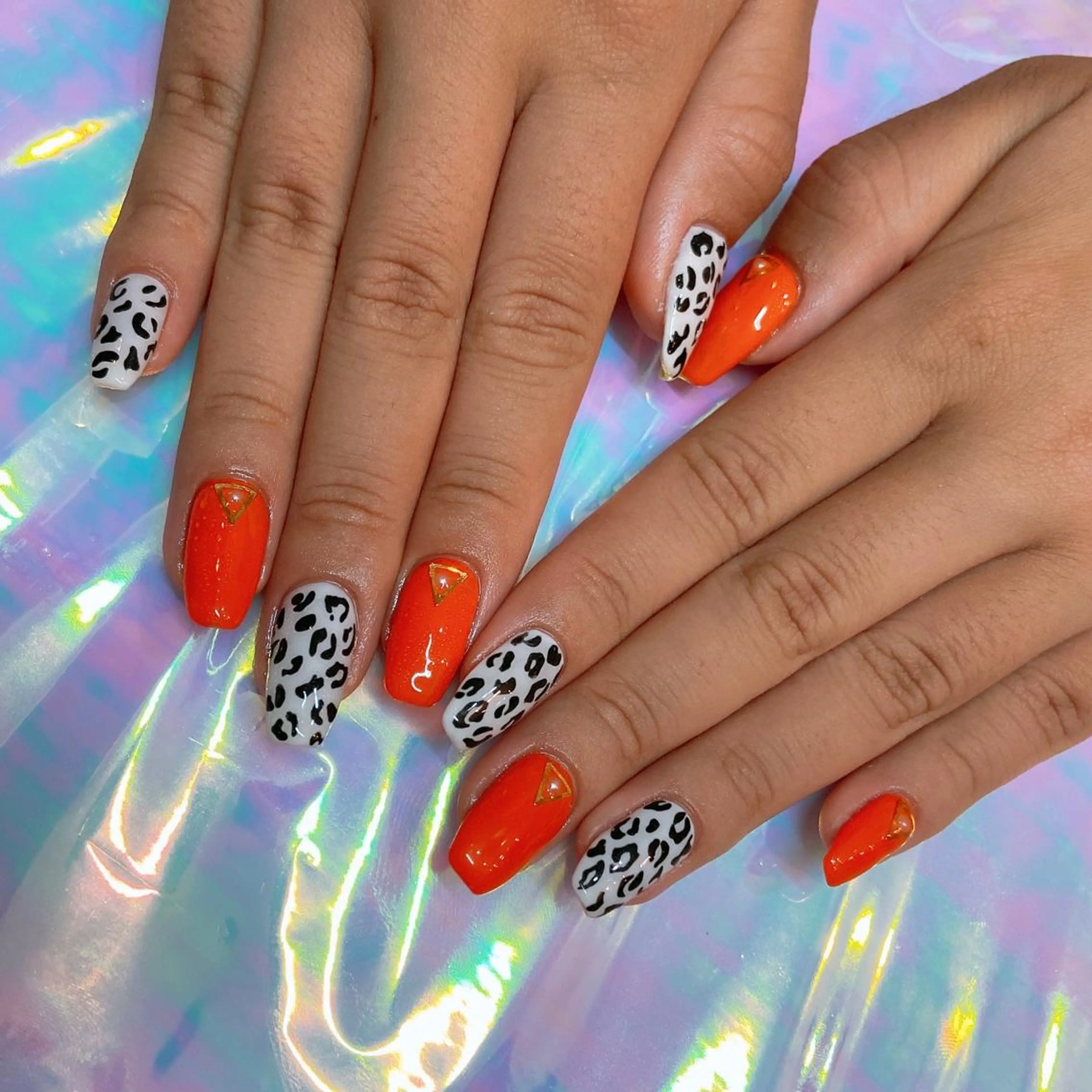 ネイル アニマル柄 オレンジ nailbios所属・nailbios .tomo.のネイルデザイン