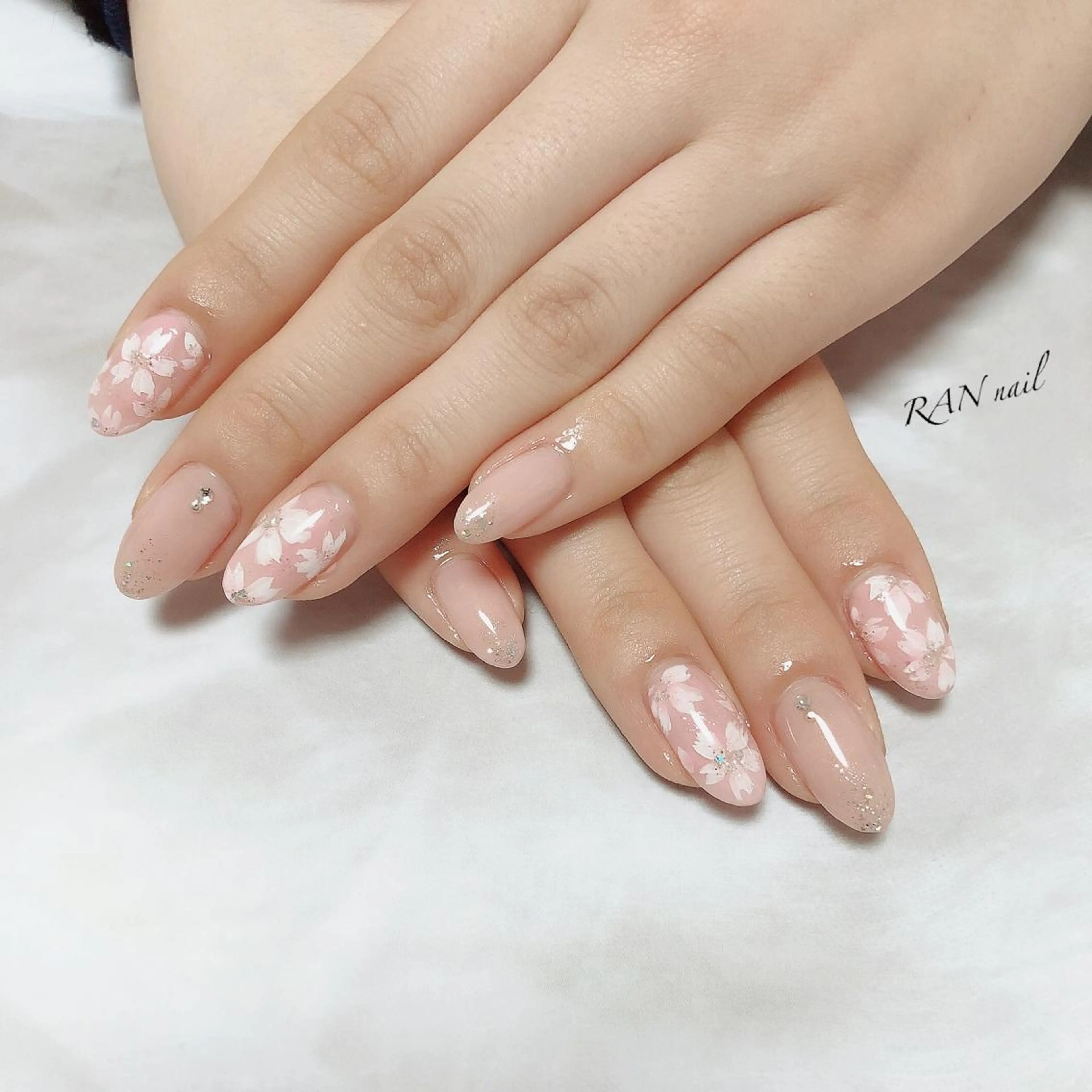 ネイル 桜ネイル ラメ(グリッター) オフィスネイル ワンカラーネイル ピンク ハンドネイル フットネイル RAN nail 〜ランネイル〜所属・RAN nailのネイルデザイン