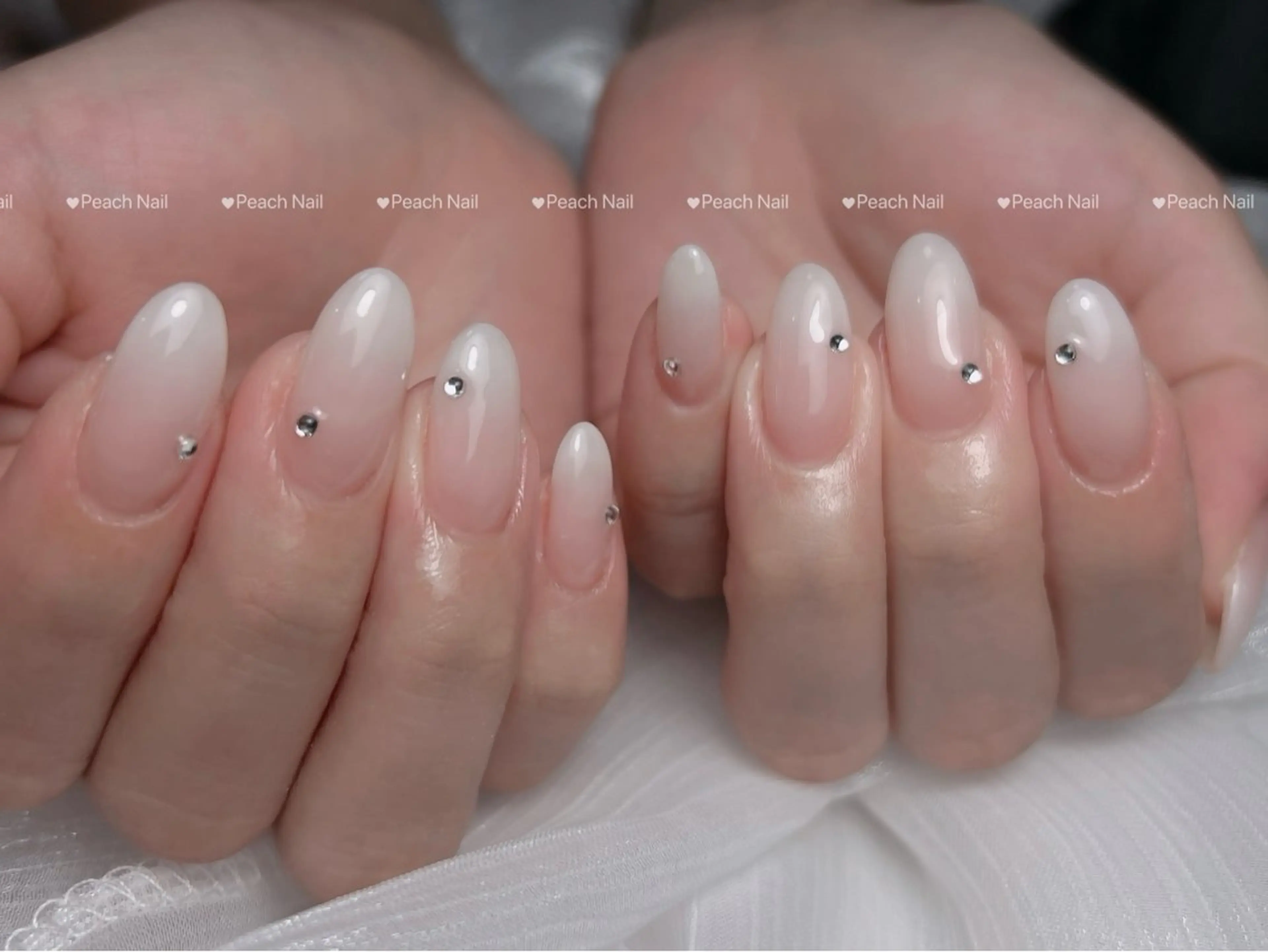 乳白グラデ🎶ベイビーブーマーネイルの写真