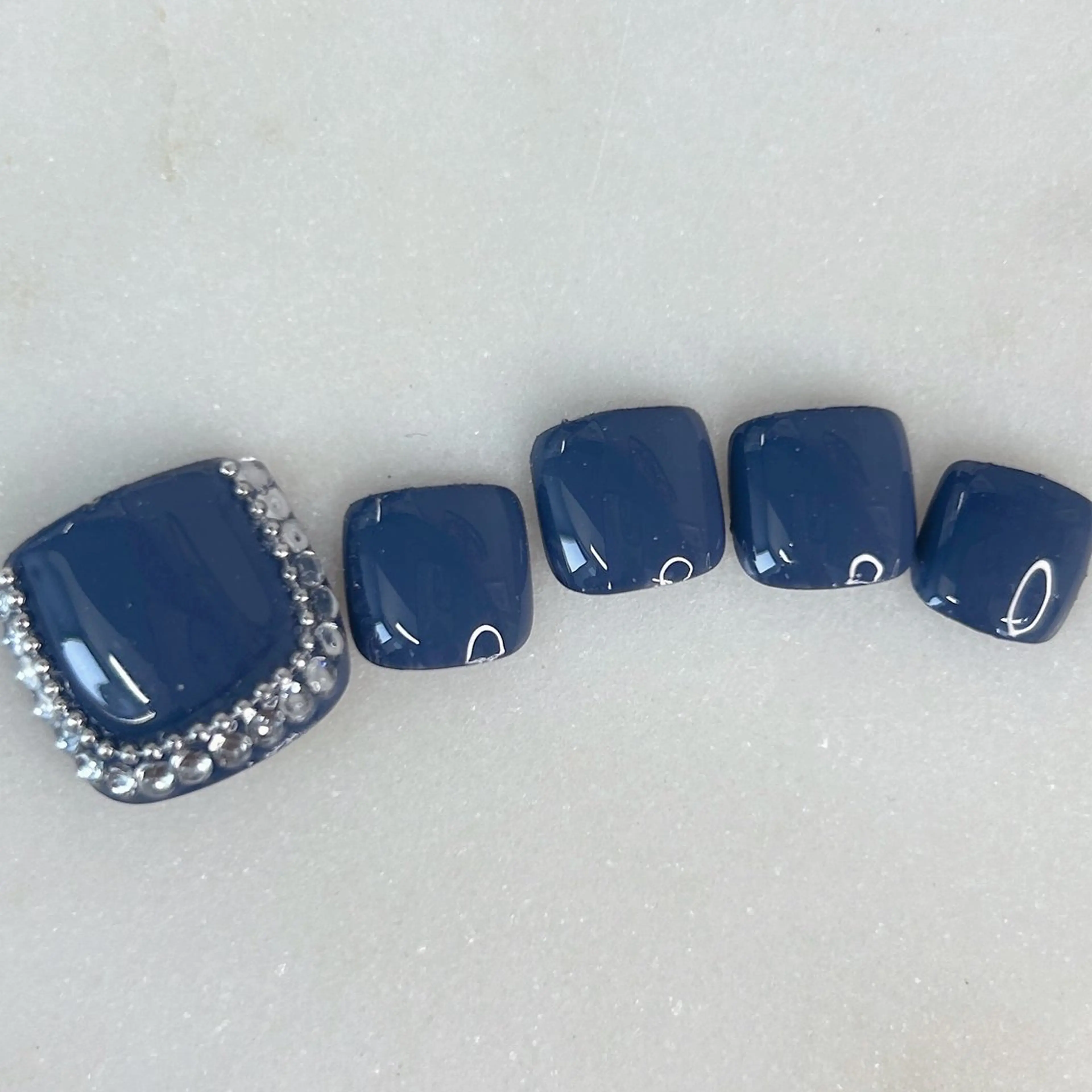 ネイル ブルー 桜ネイル フットネイル キラキラネイル ネイビー フットネイル Forca total studio所属・Forca Airaのネイルデザイン