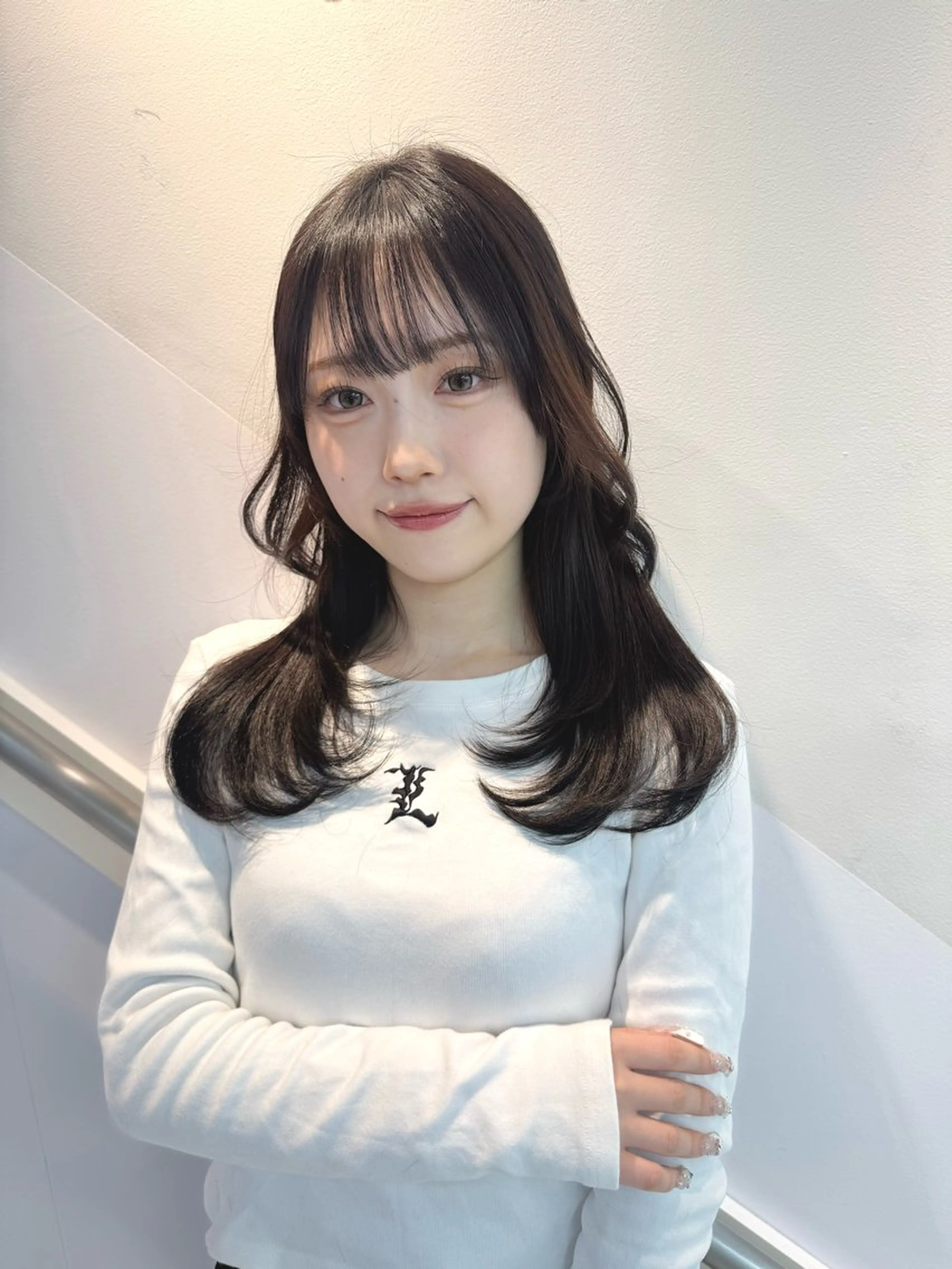 【撮影モデル】ミディアムレイヤーカットの写真