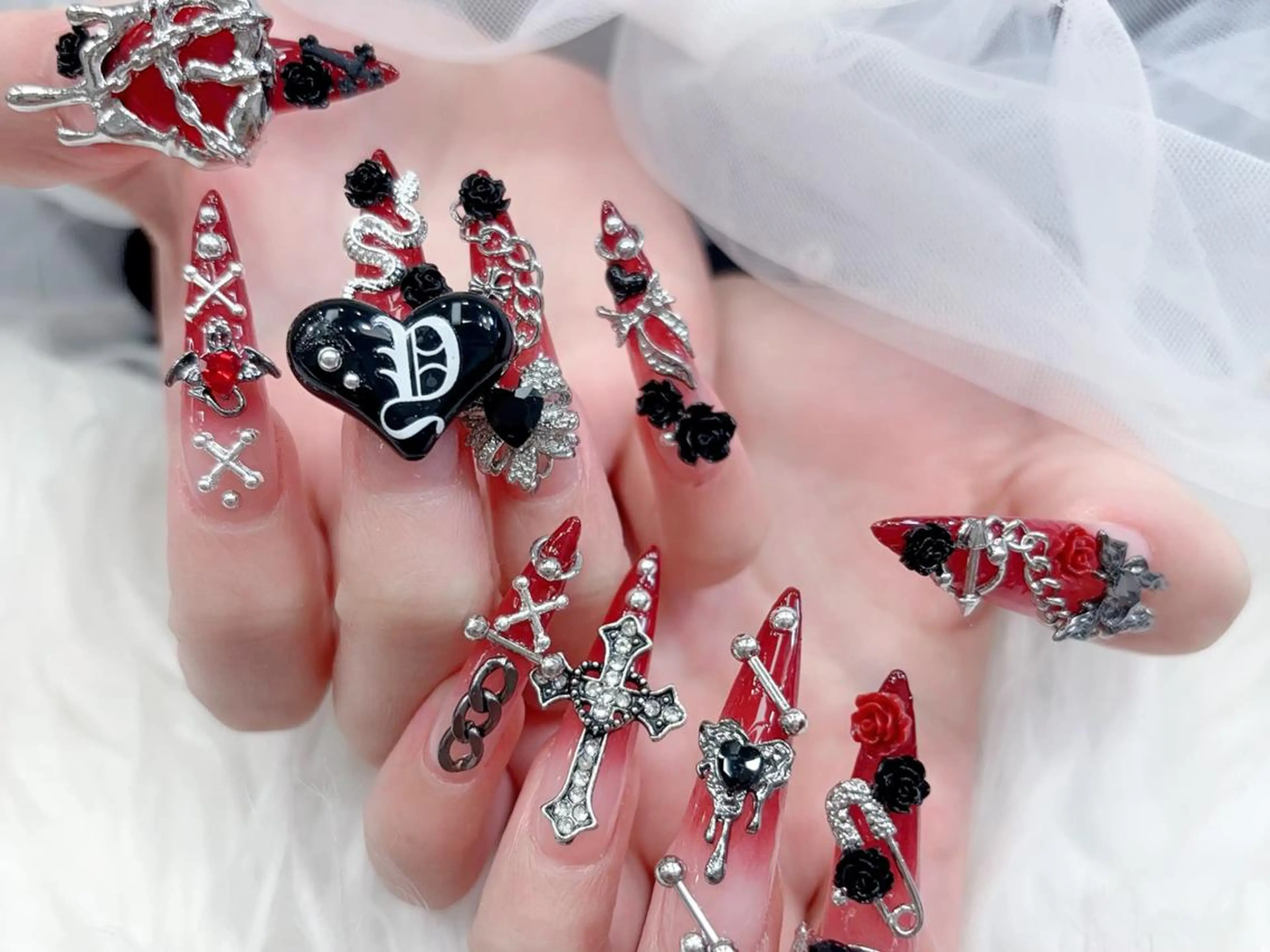 ネイル 成人式 ロングネイル マグネットネイル 大理石ネイル(マーブル) リボン kawaiiko サロンのネイルデザイン