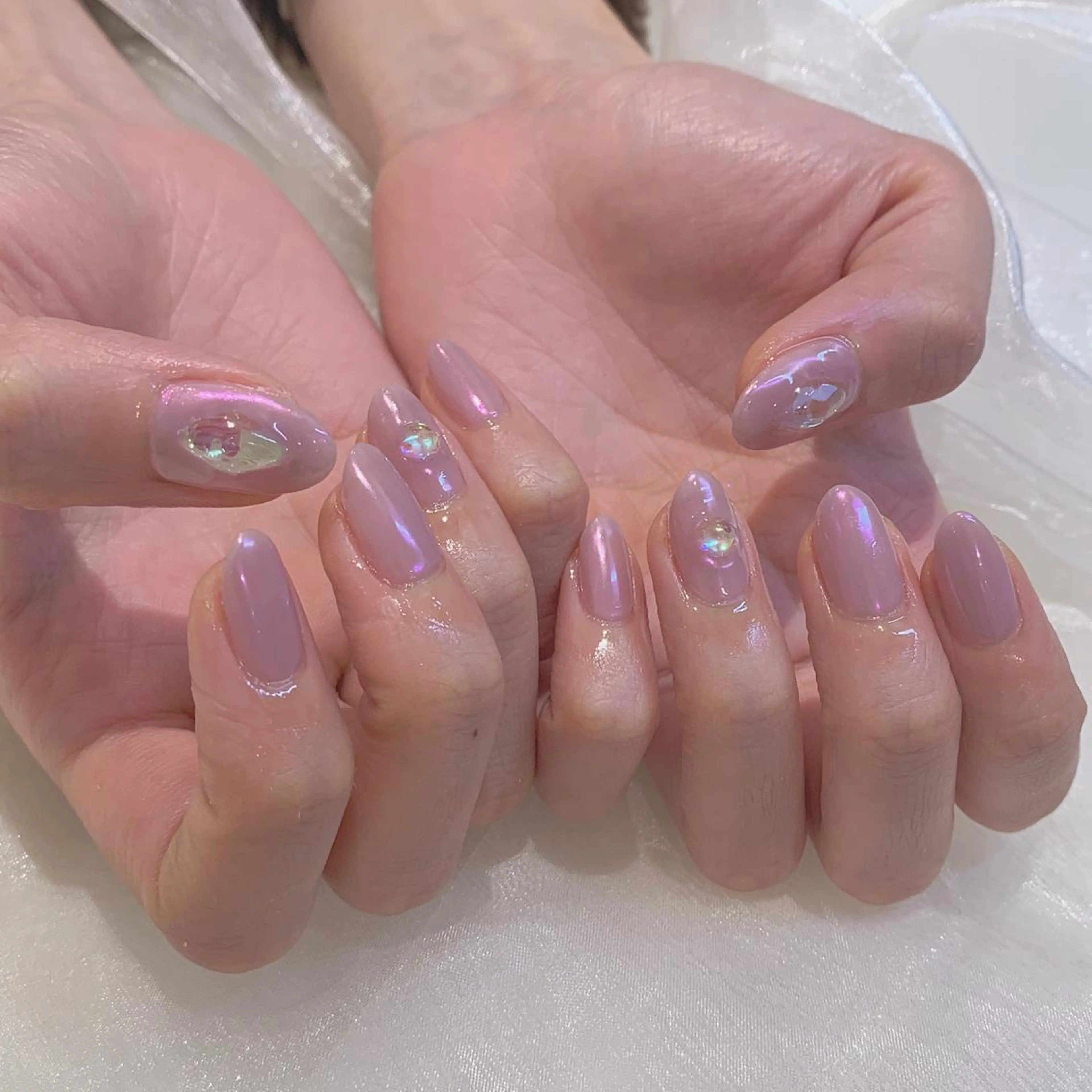 ネイル オーロラネイル 𝘙𝘪𝘰𝘯𝘢 ...🕯🤍のネイルデザイン