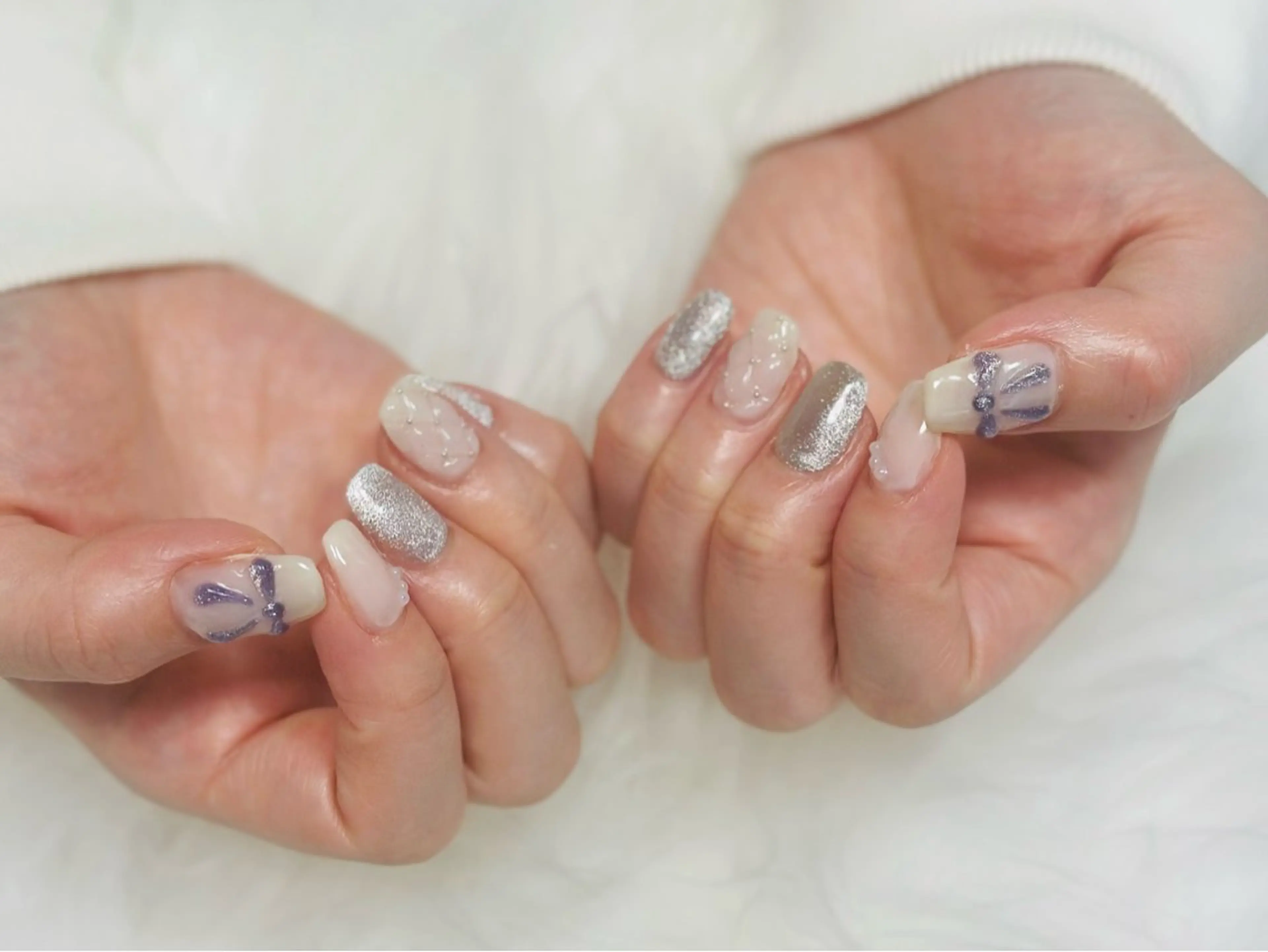 ネイル アートネイル ぷっくりネイル リボン nailsalon oluoluのネイルデザイン