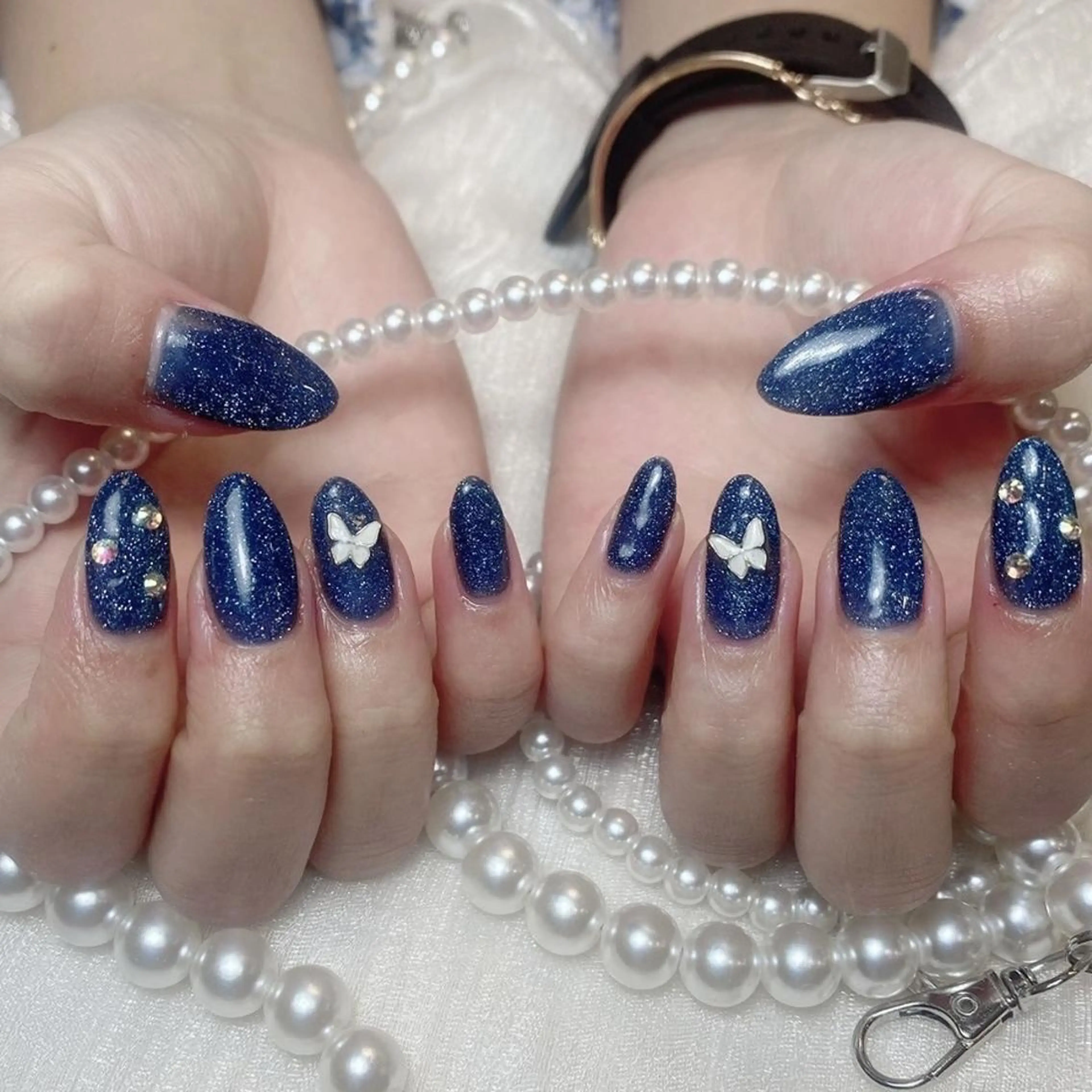 ネイル RAFFINE 月🦋🩵のネイルデザイン