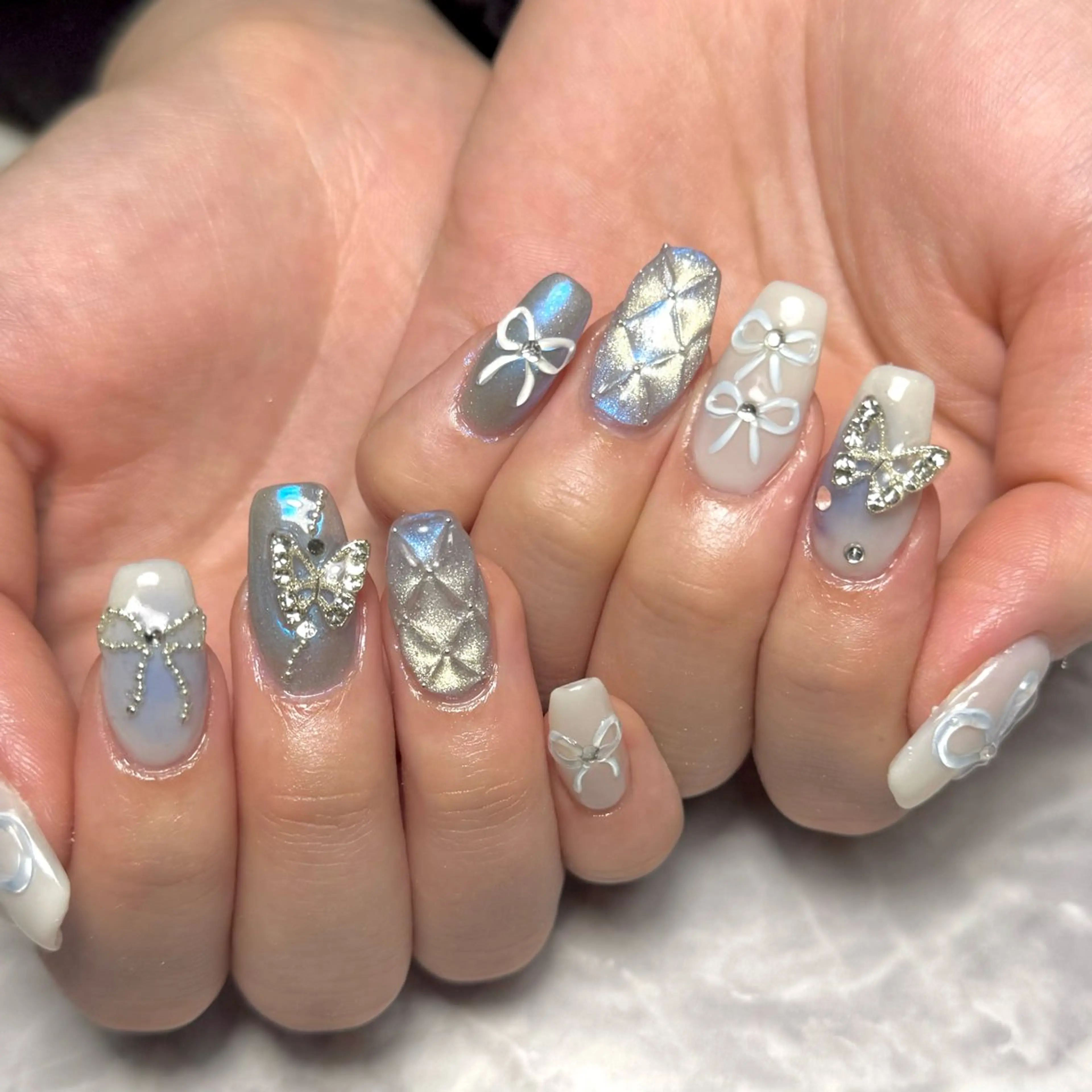 ネイル チークネイル マグネットネイル リボン 夏ネイル ハンドネイル Nail Salon Lillion【リリオン】所属・lillion karenのネイルデザイン