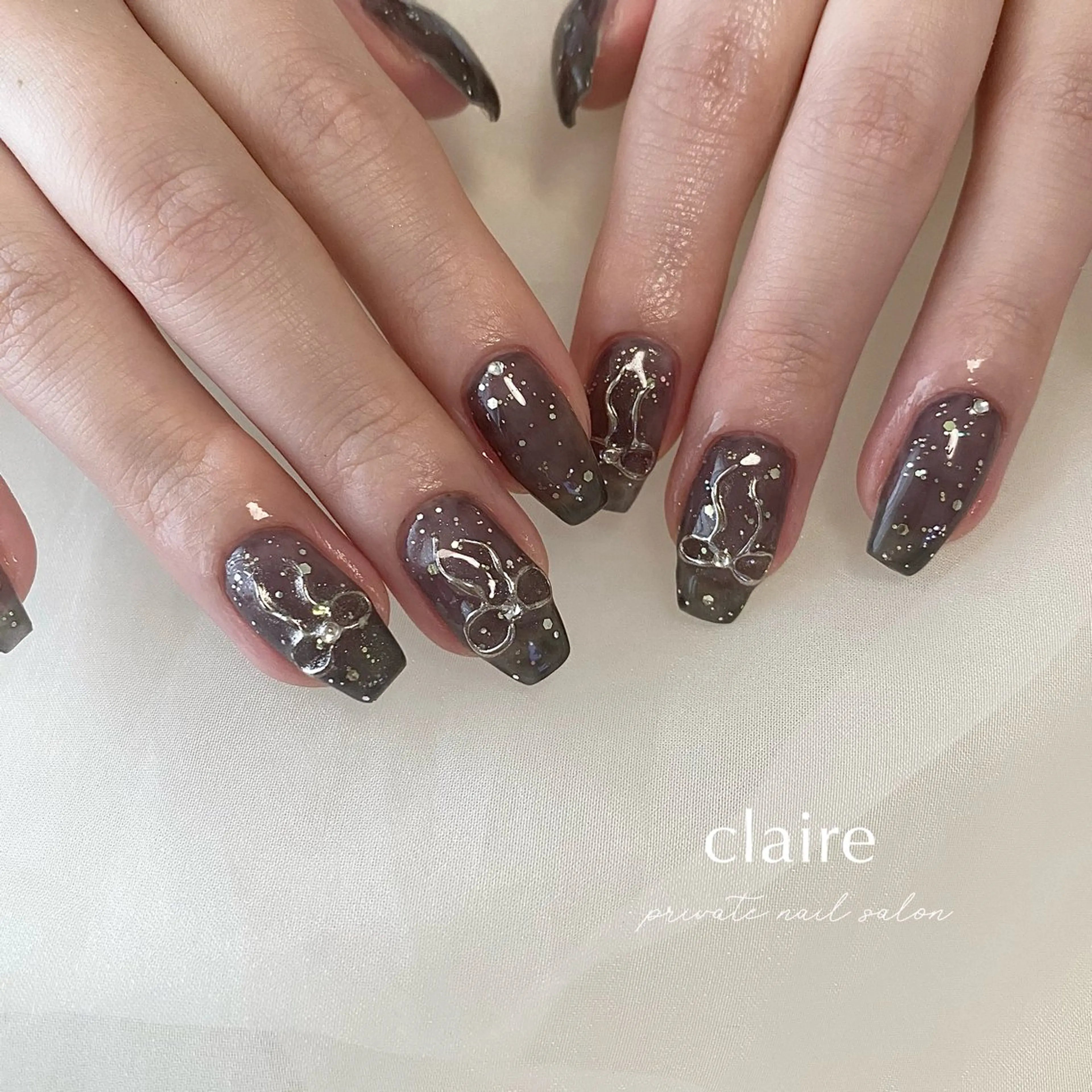 ネイル アートネイル ミラーネイル リボン ハンドネイル claire_ rie.のネイルデザイン