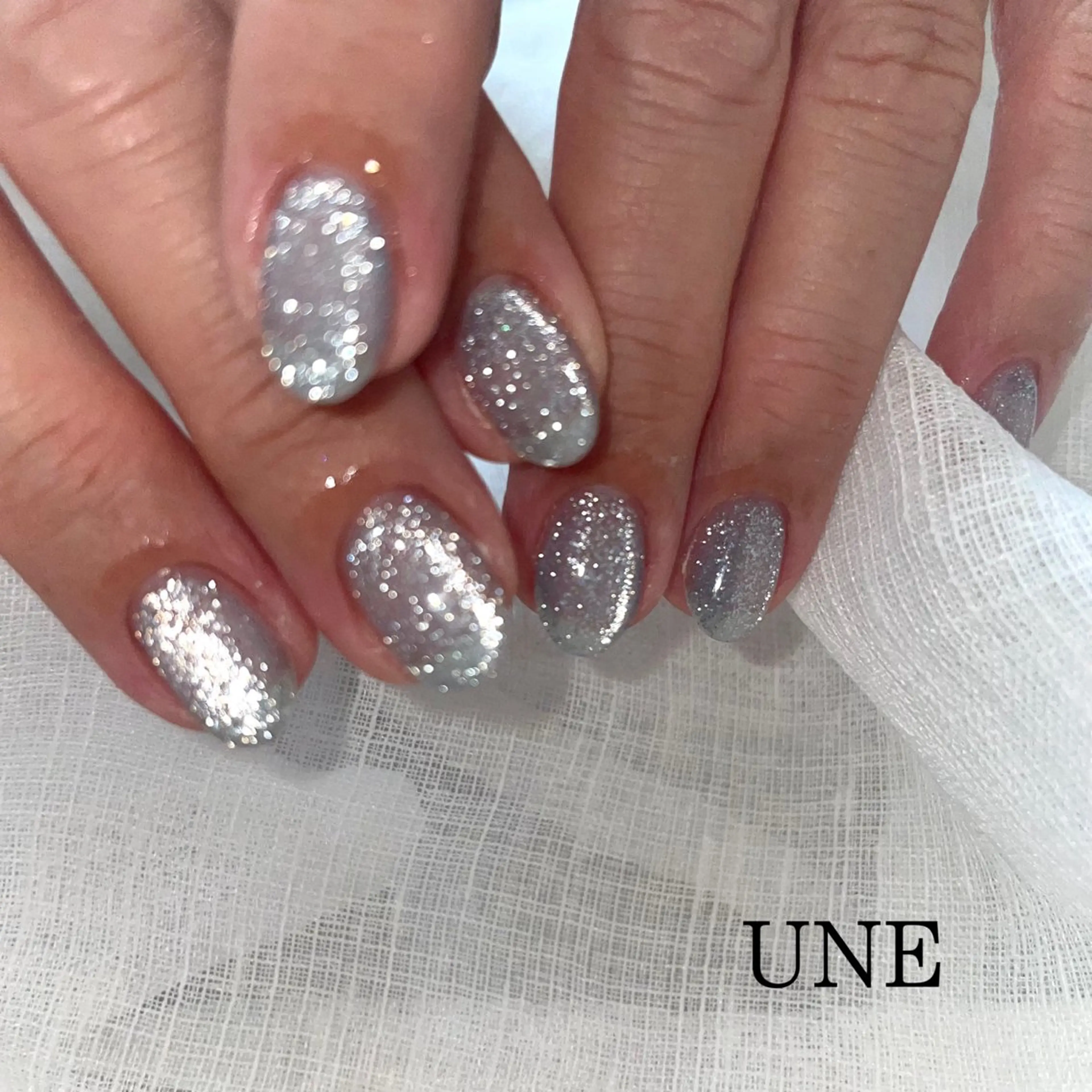 ネイル フラッシュネイル キラキラネイル マグネットネイル UNE.【ユヌ】 Jr.NANAのネイルデザイン