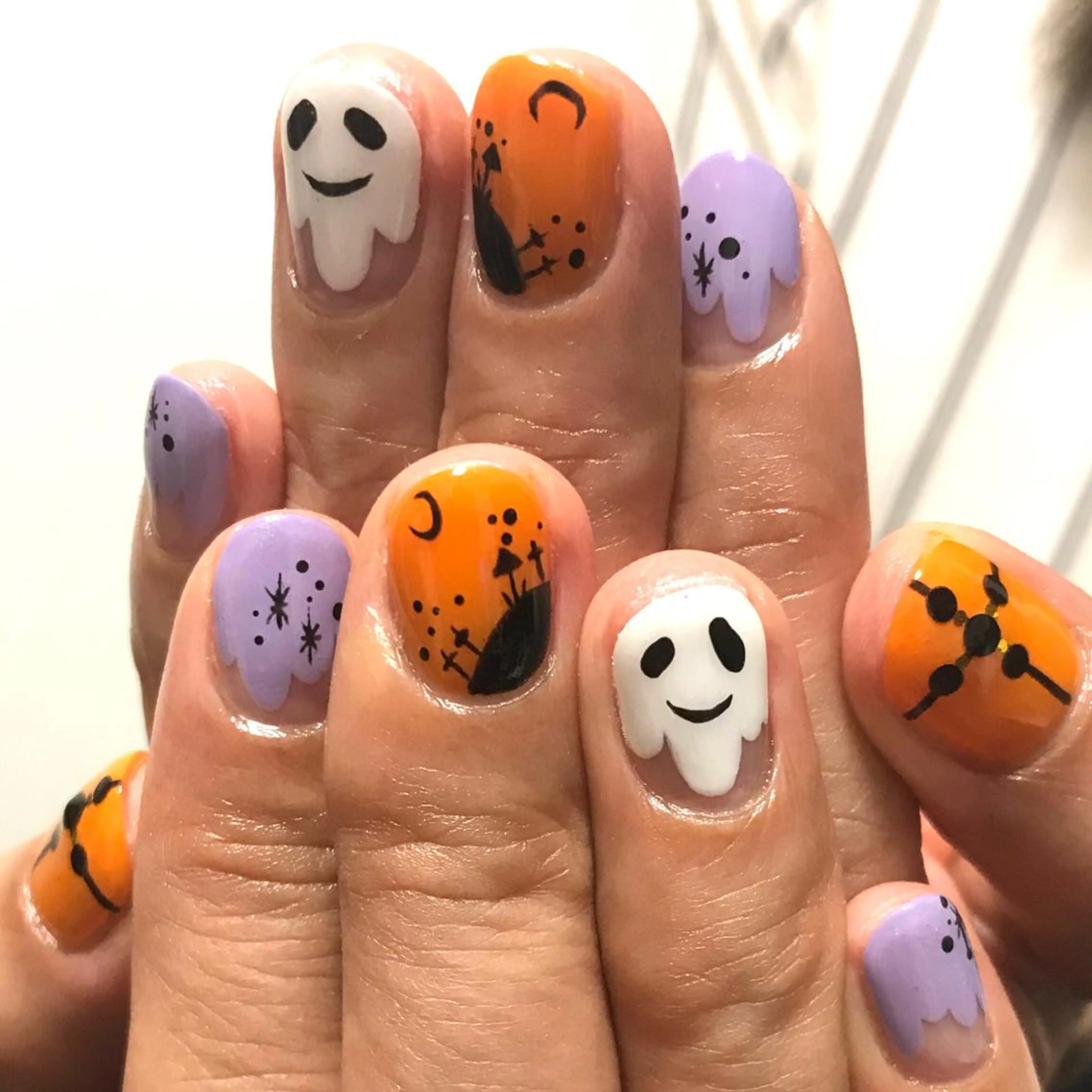 ネイル アートネイル ハロウィン オレンジ パープル ステラ marikominoのネイルデザイン