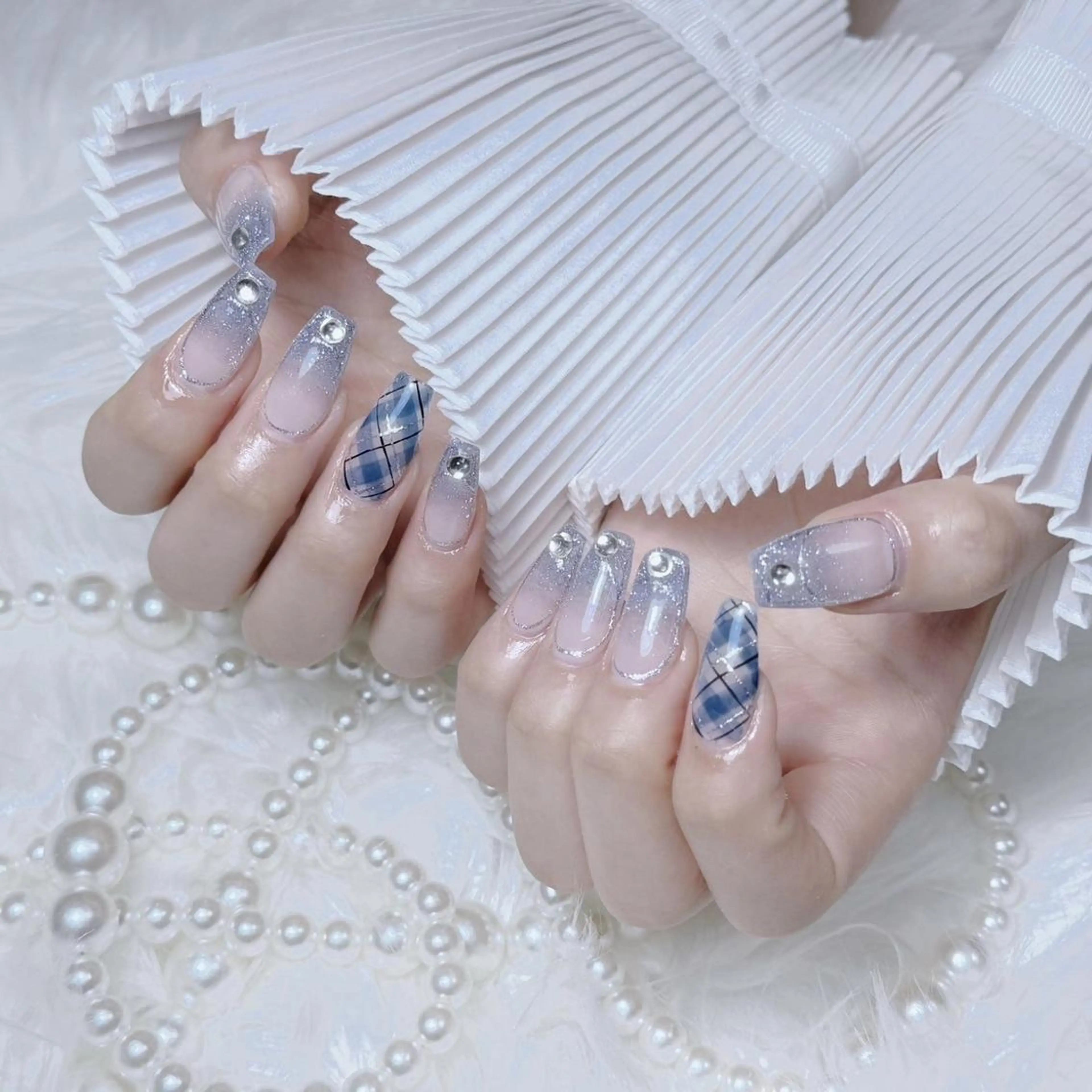 ネイル RAFFINE 月🦋🩵のネイルデザイン