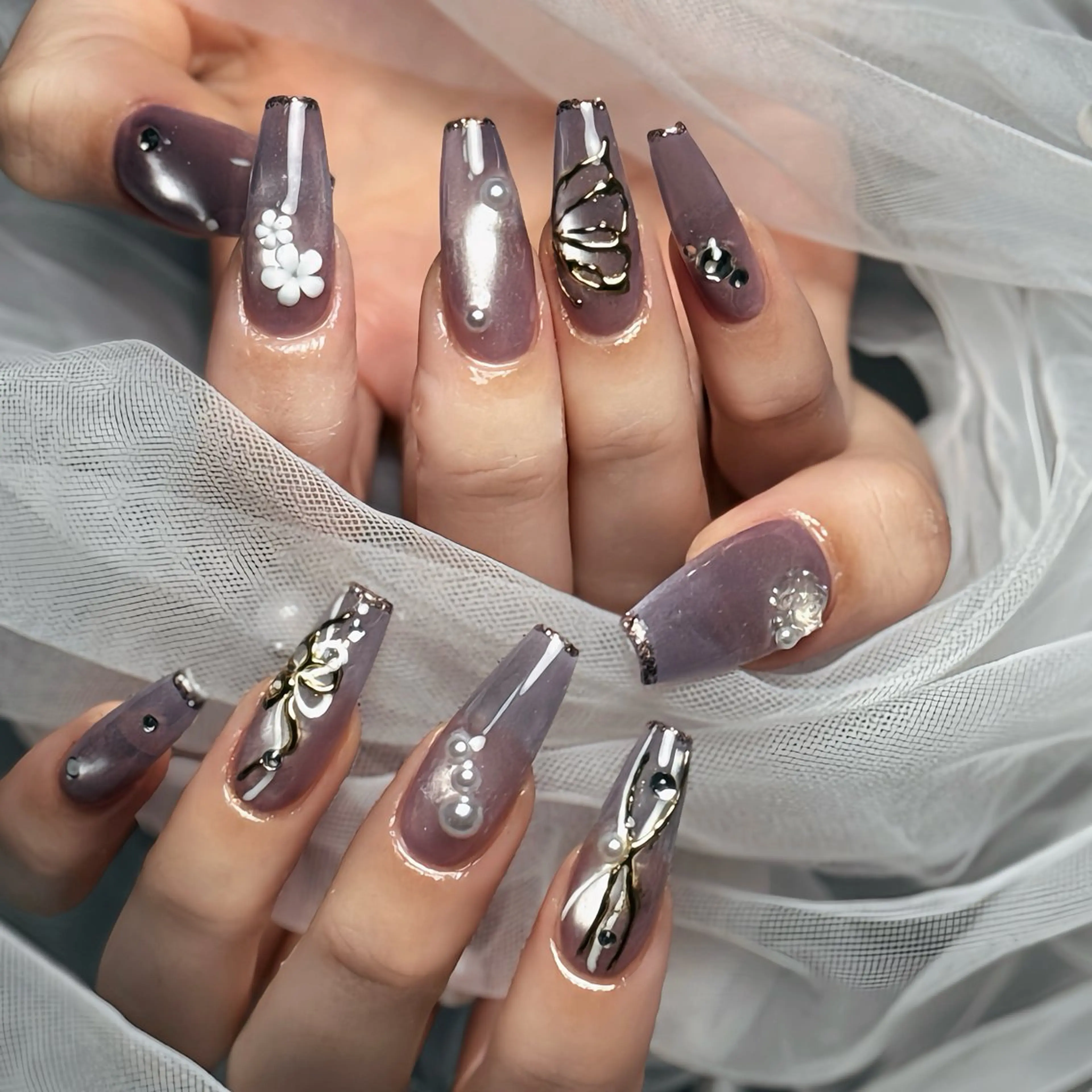 ネイル 長さ出し キラキラネイル ワンホンネイル NEM.nailstudio所属・NEM nailstudioのネイルデザイン