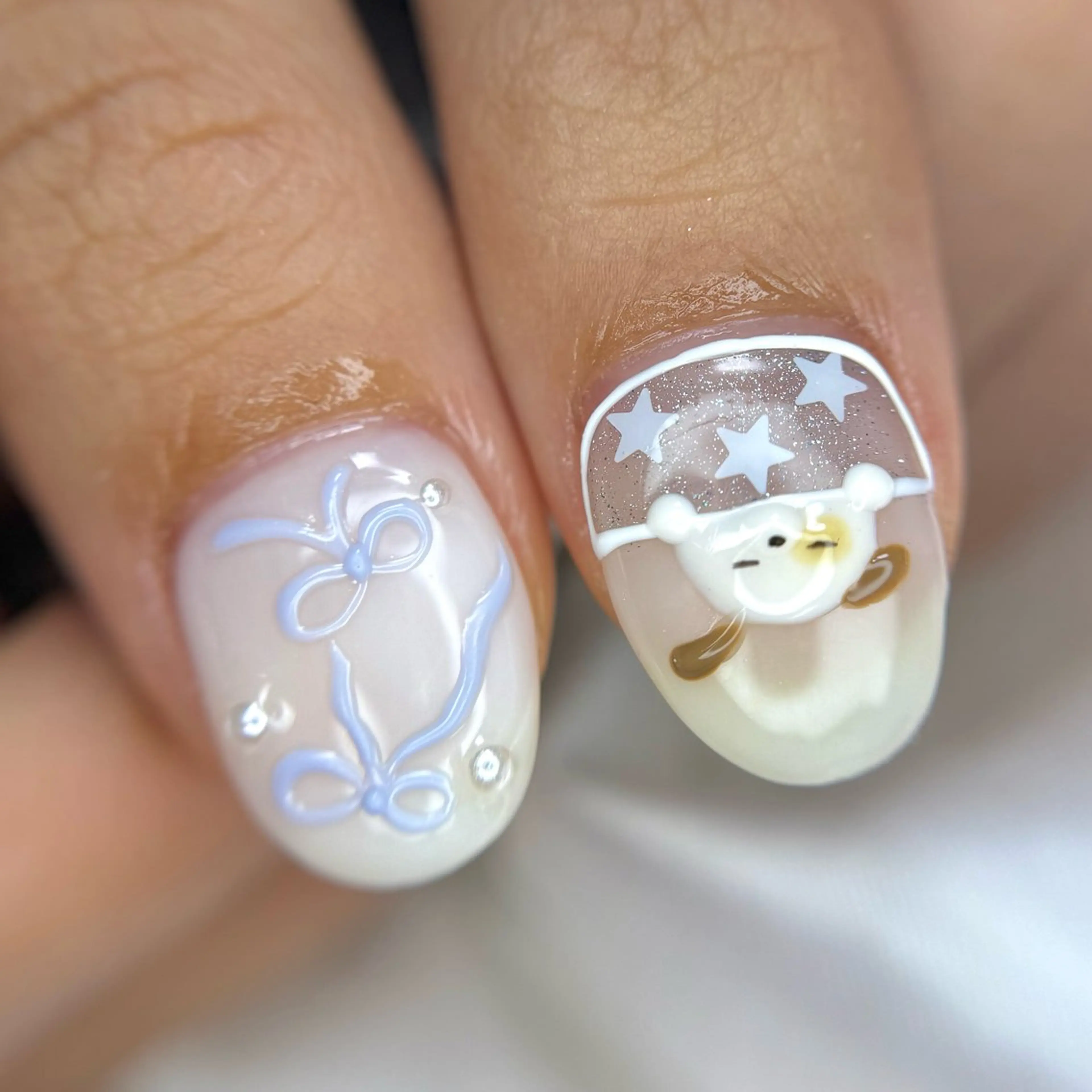 ネイル アートネイル マグネットネイル ぷっくりネイル リボン 冬ネイル ハンドネイル OKIKA所属・【OKIKA】 らん🦖🌈🧡のマツエク・マツパデザイン