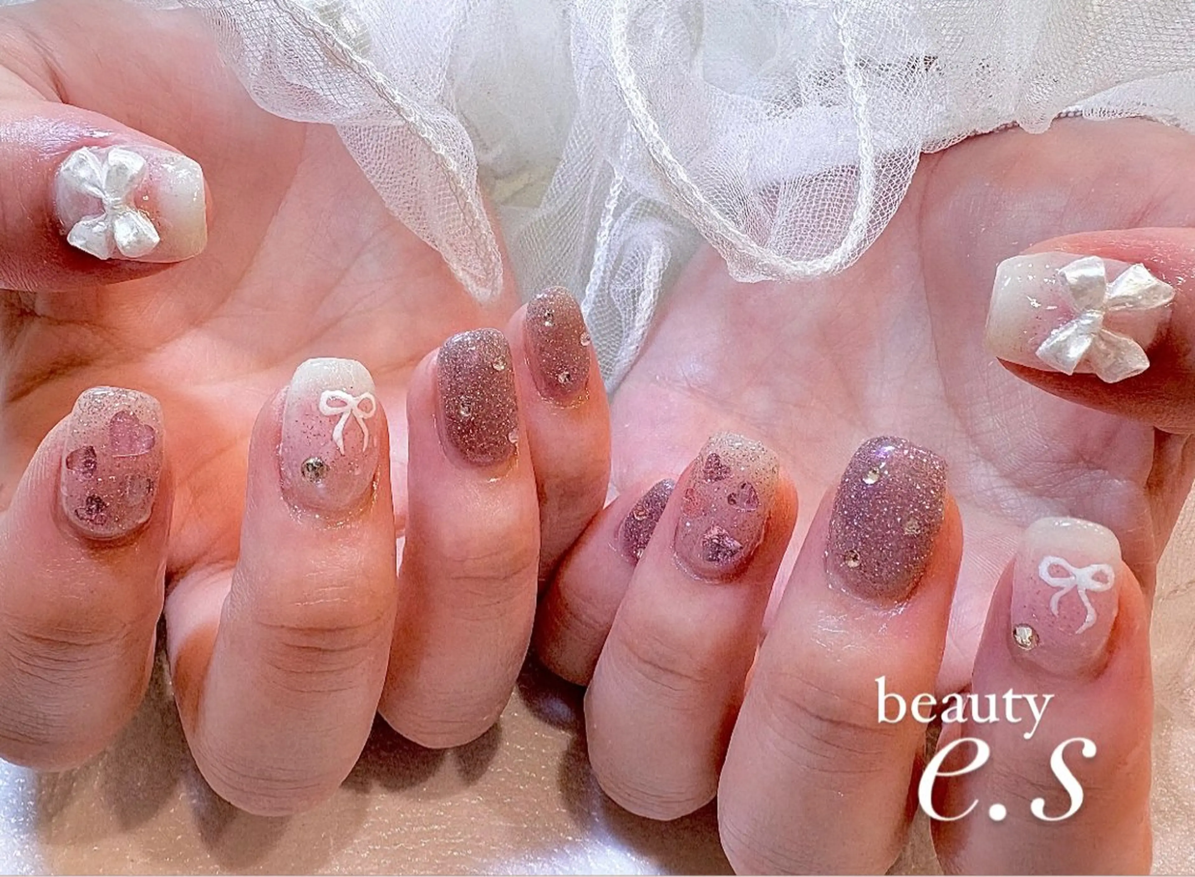 ネイル フラッシュネイル キラキラネイル リボン nail e.sのネイルデザイン
