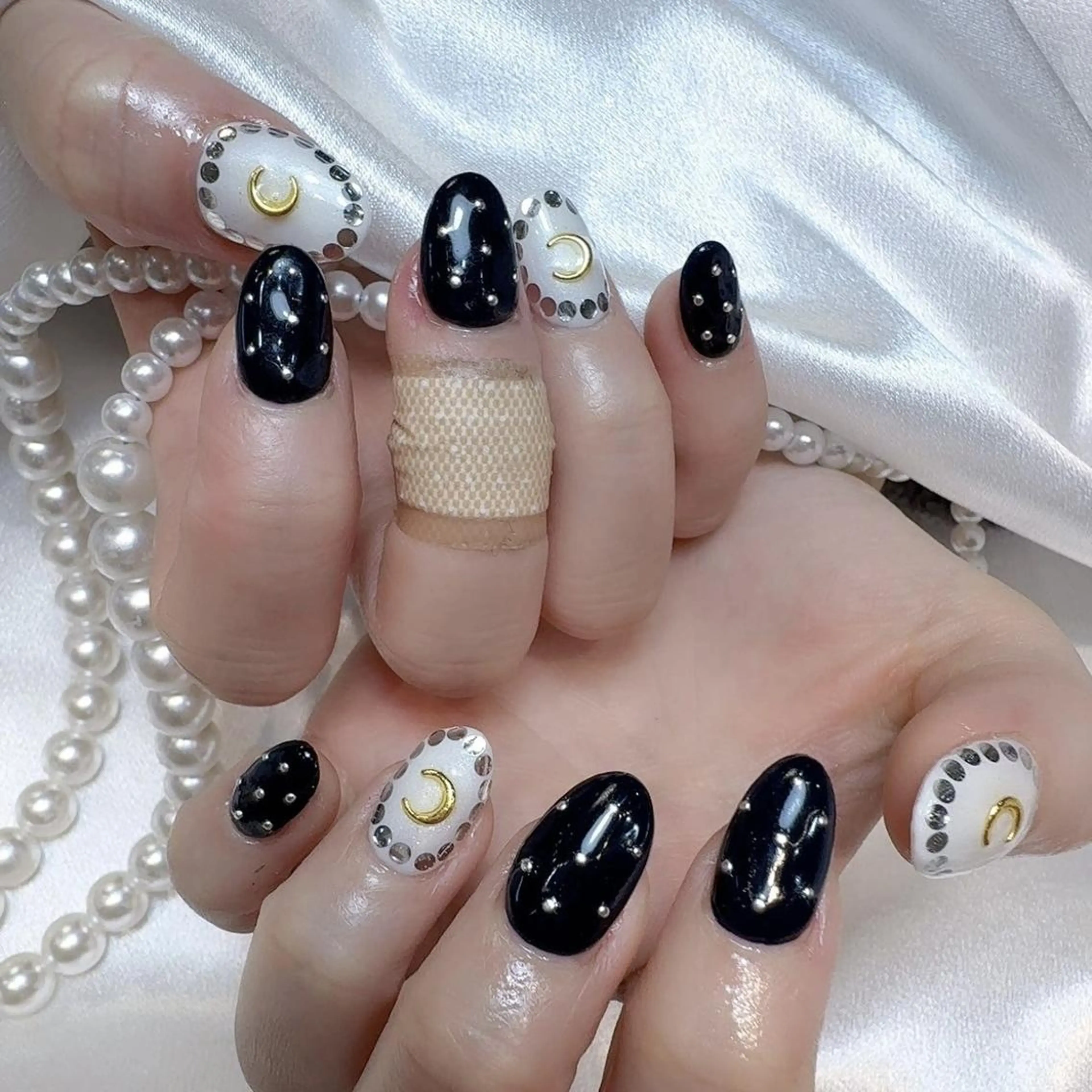 ネイル RAFFINE 月🦋🩵のネイルデザイン