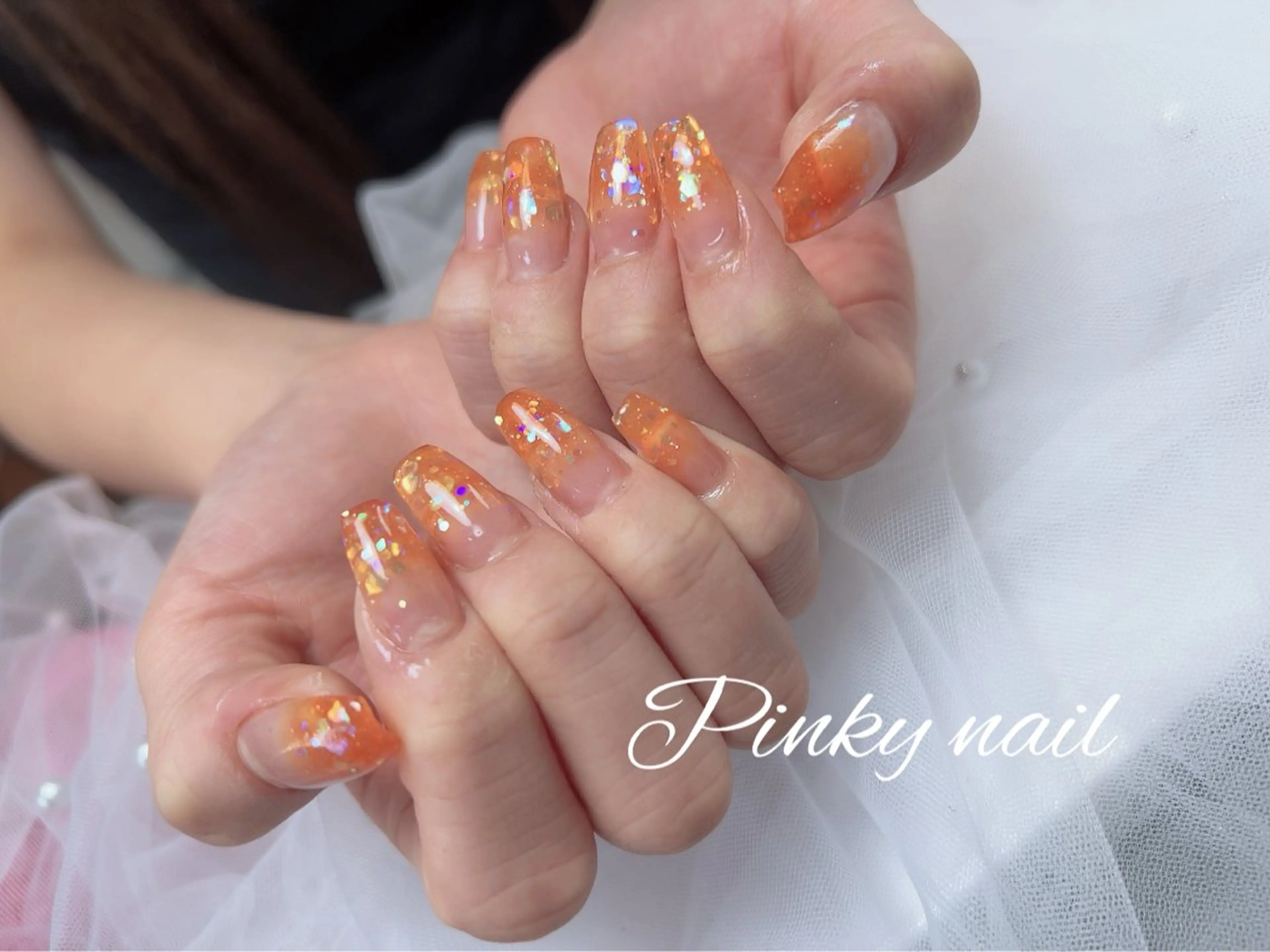 ネイル クリアネイル グラデーション ラメ(グリッター) ラメグラデーション オレンジ ハンドネイル 高野 祐紀のネイルデザイン