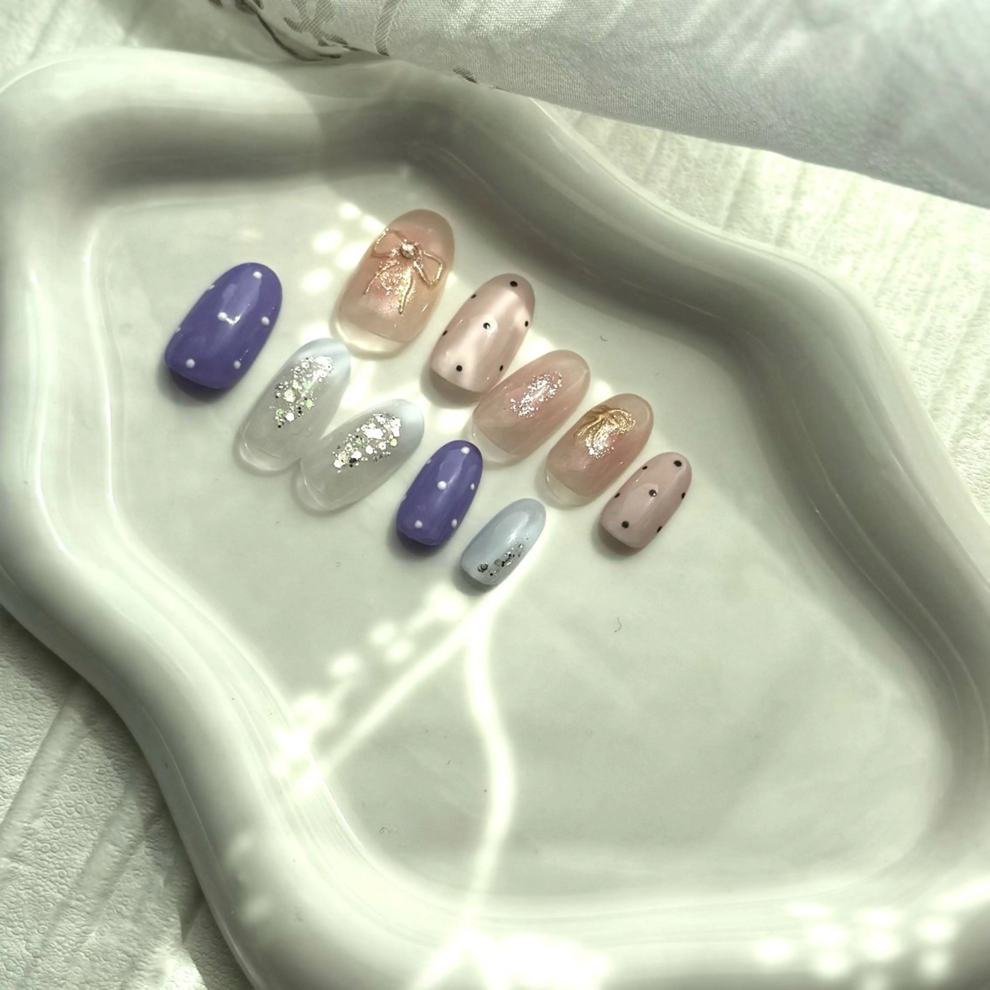 ネイル ドット リボン ハンドネイル N.plus NaiLのネイルデザイン