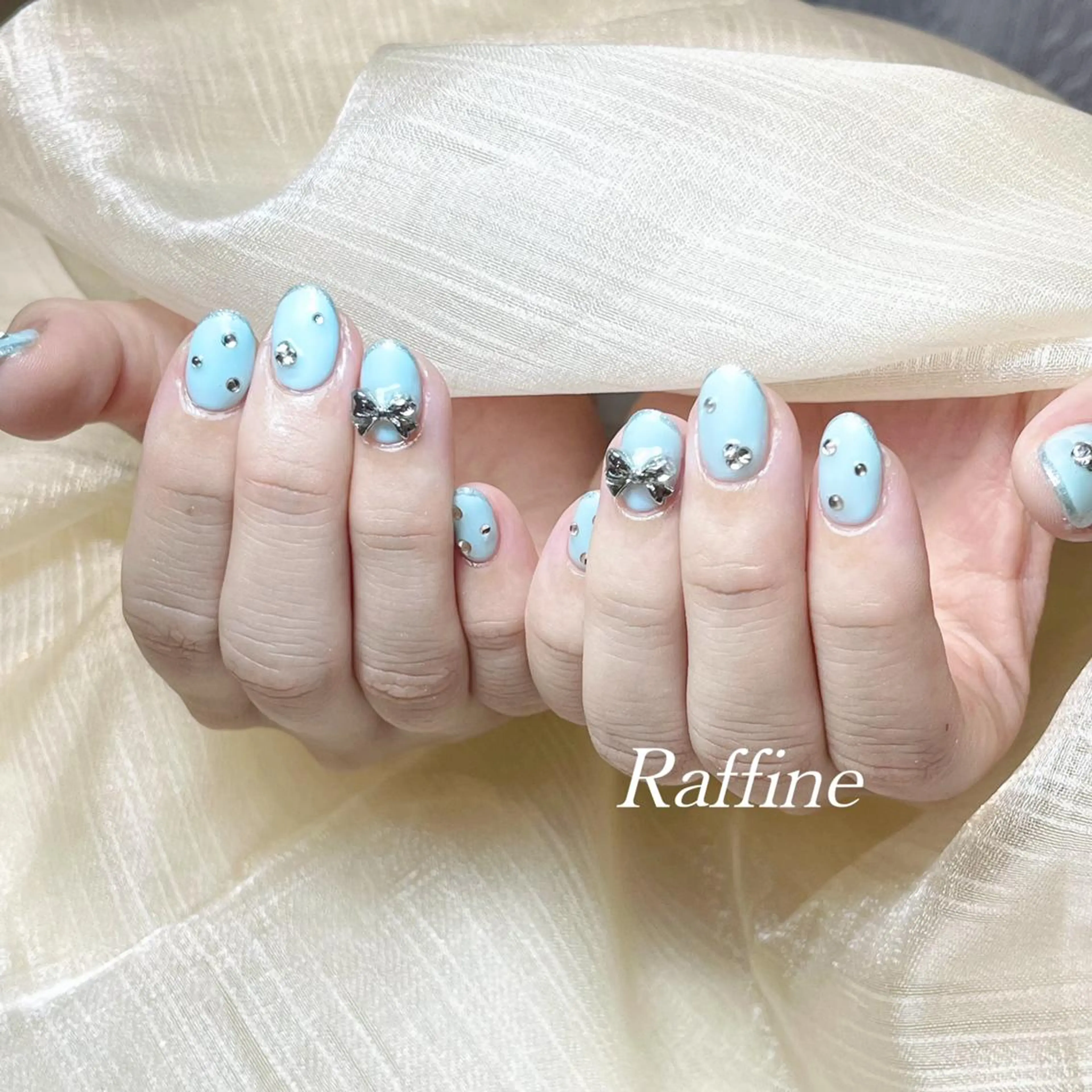 ネイル RAFFINE 月🦋🩵のネイルデザイン