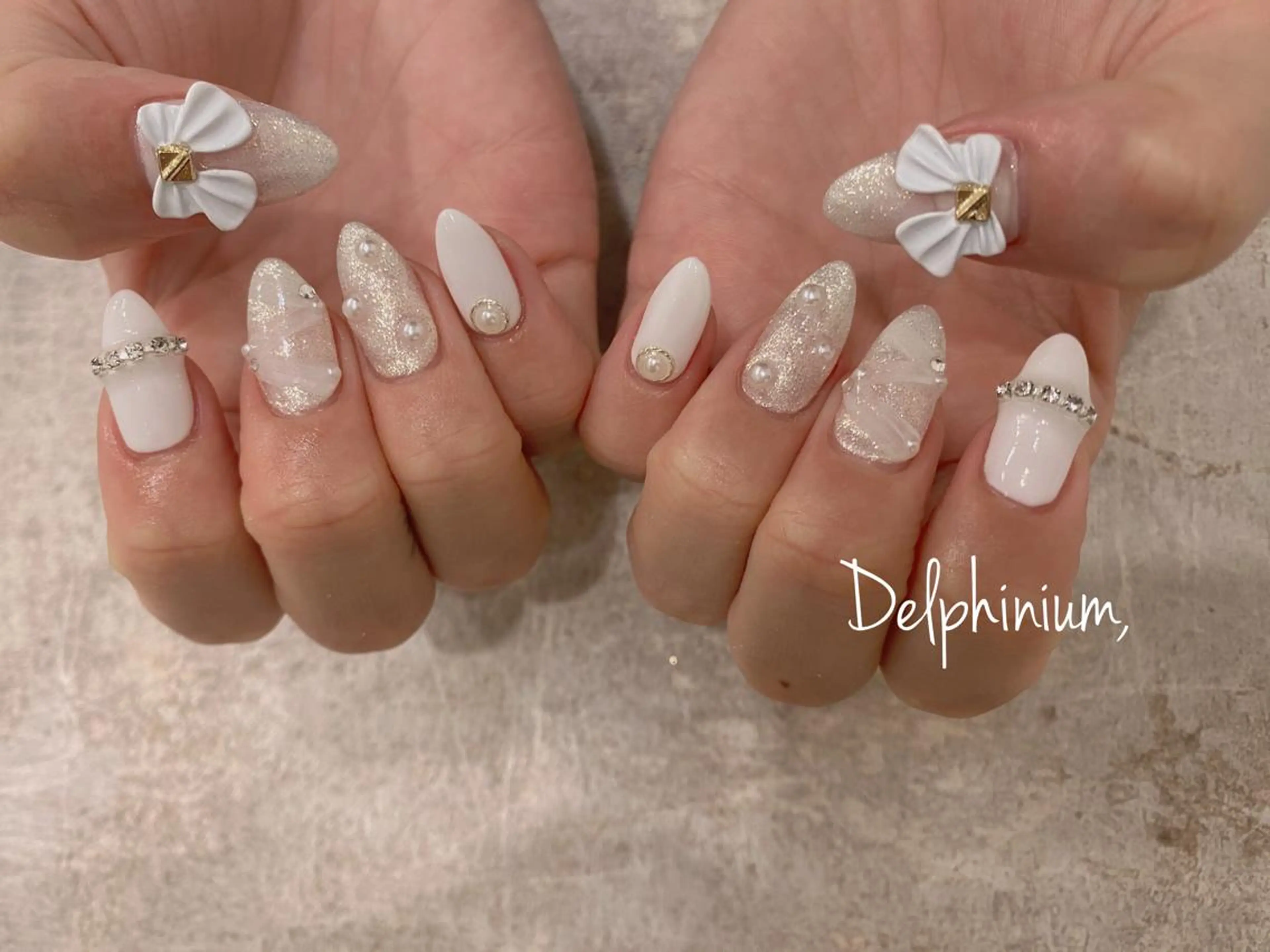 ネイル アートネイル 韓国ネイル リボン 冬ネイル クリスマス ハンドネイル 岡本 友恵のネイルデザイン