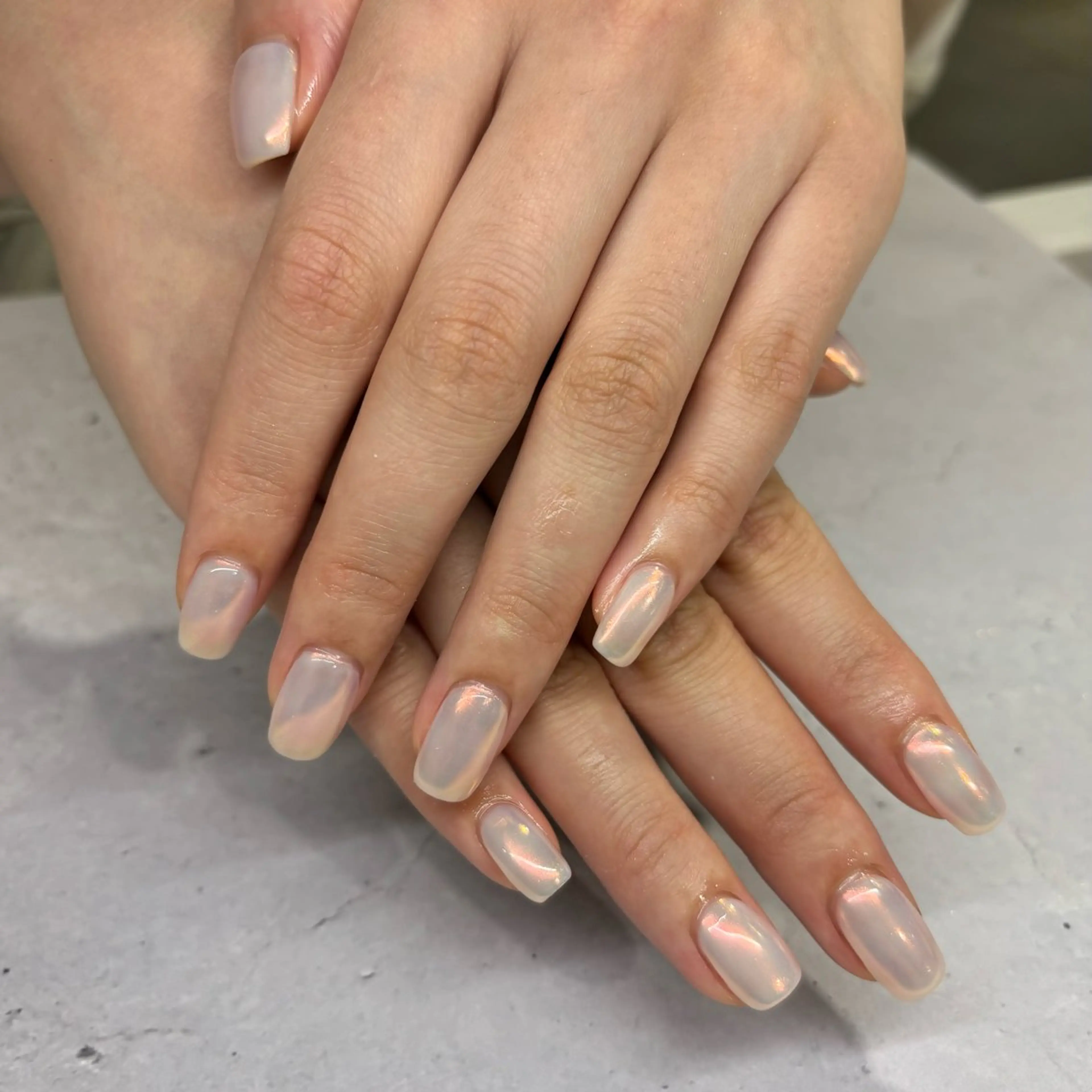 ネイル オーロラネイル ワンカラーネイル オレンジ ハンドネイル 荒巻 めいのネイルデザイン