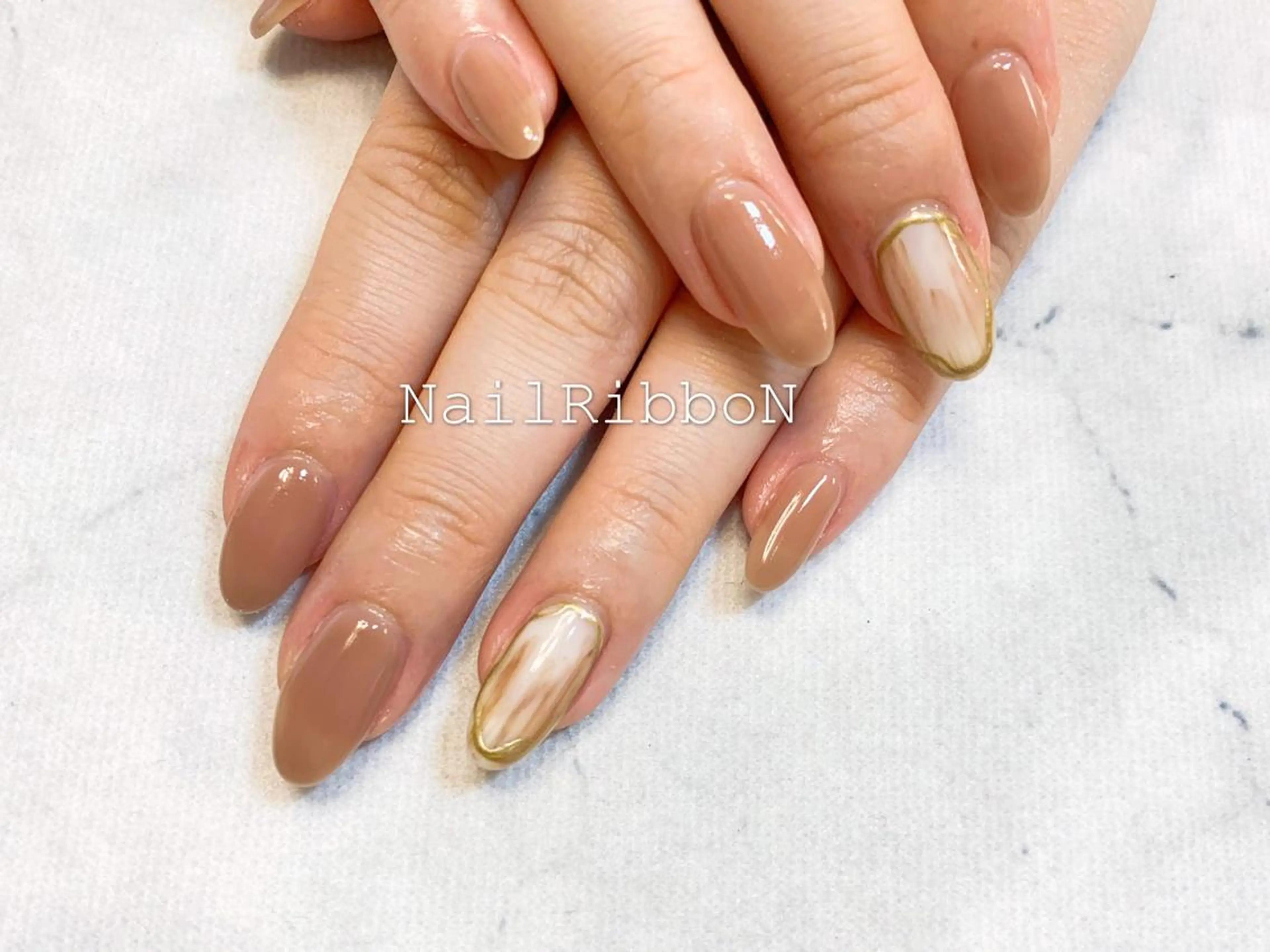 ネイル ネイルリボン 受付スタッフのネイルデザイン