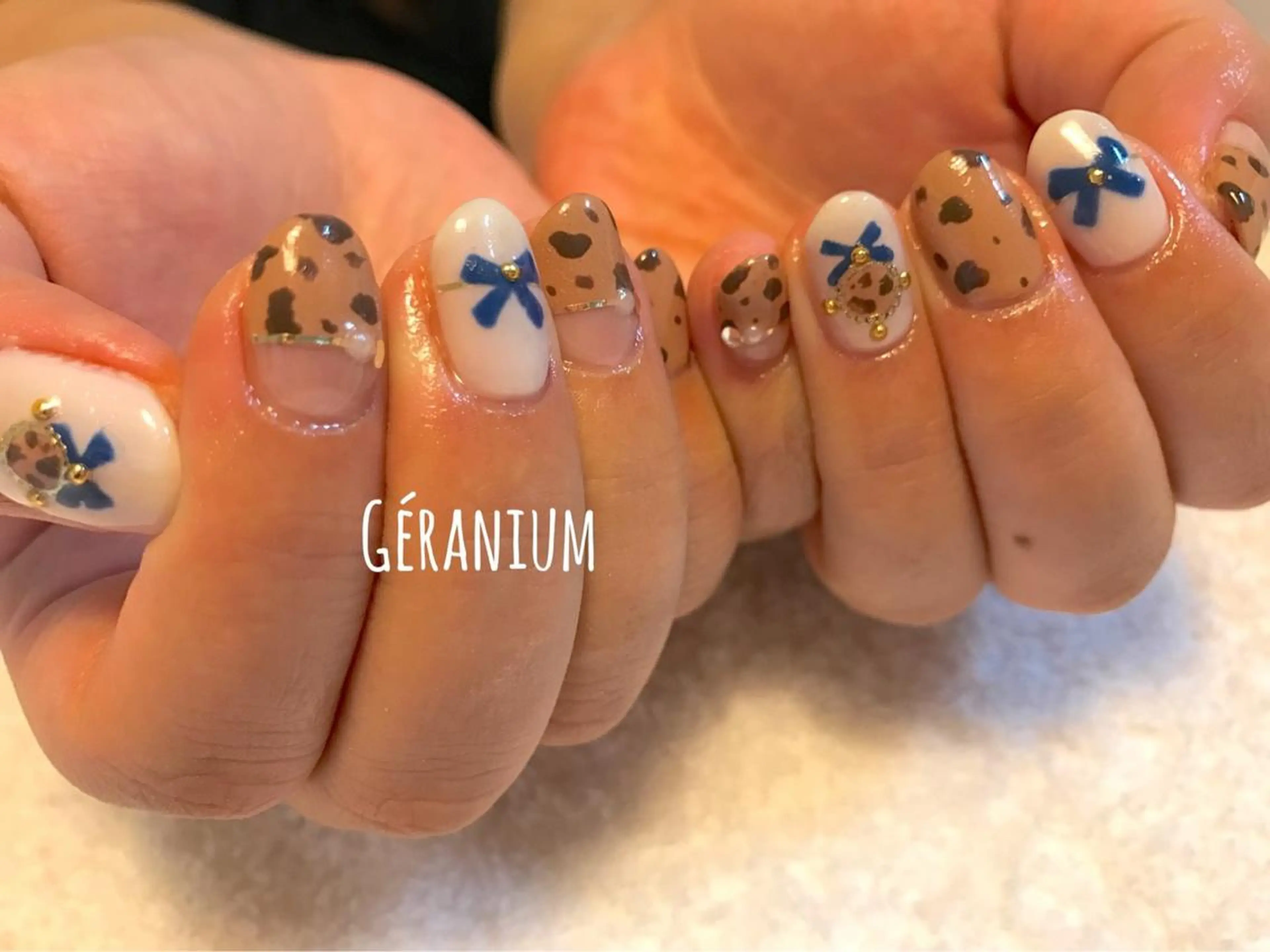 ネイル ブラウン リボン GéRanium Harukaのネイルデザイン