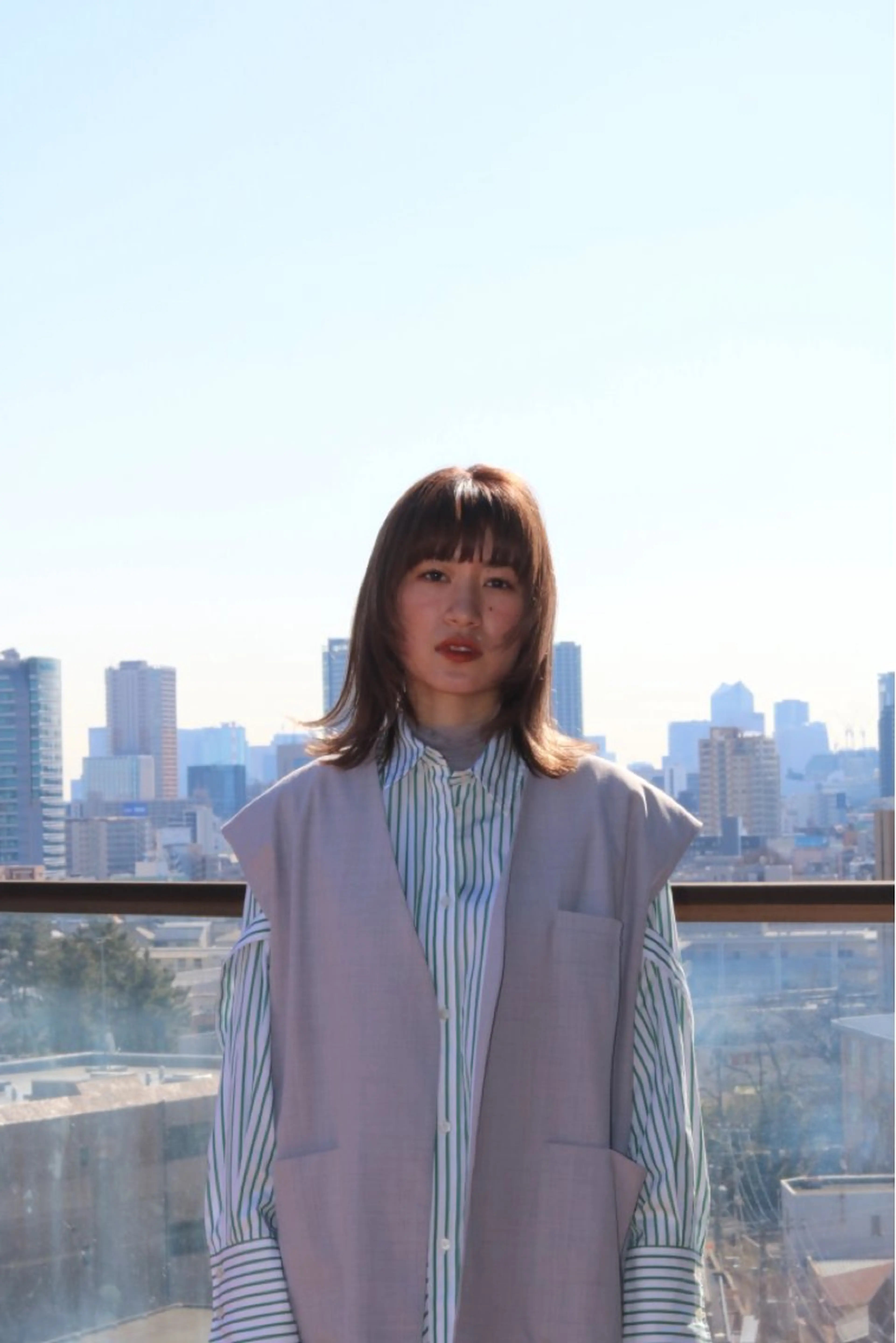 ミディアム Yui. ハイトーン/パーマ/のヘアスタイル