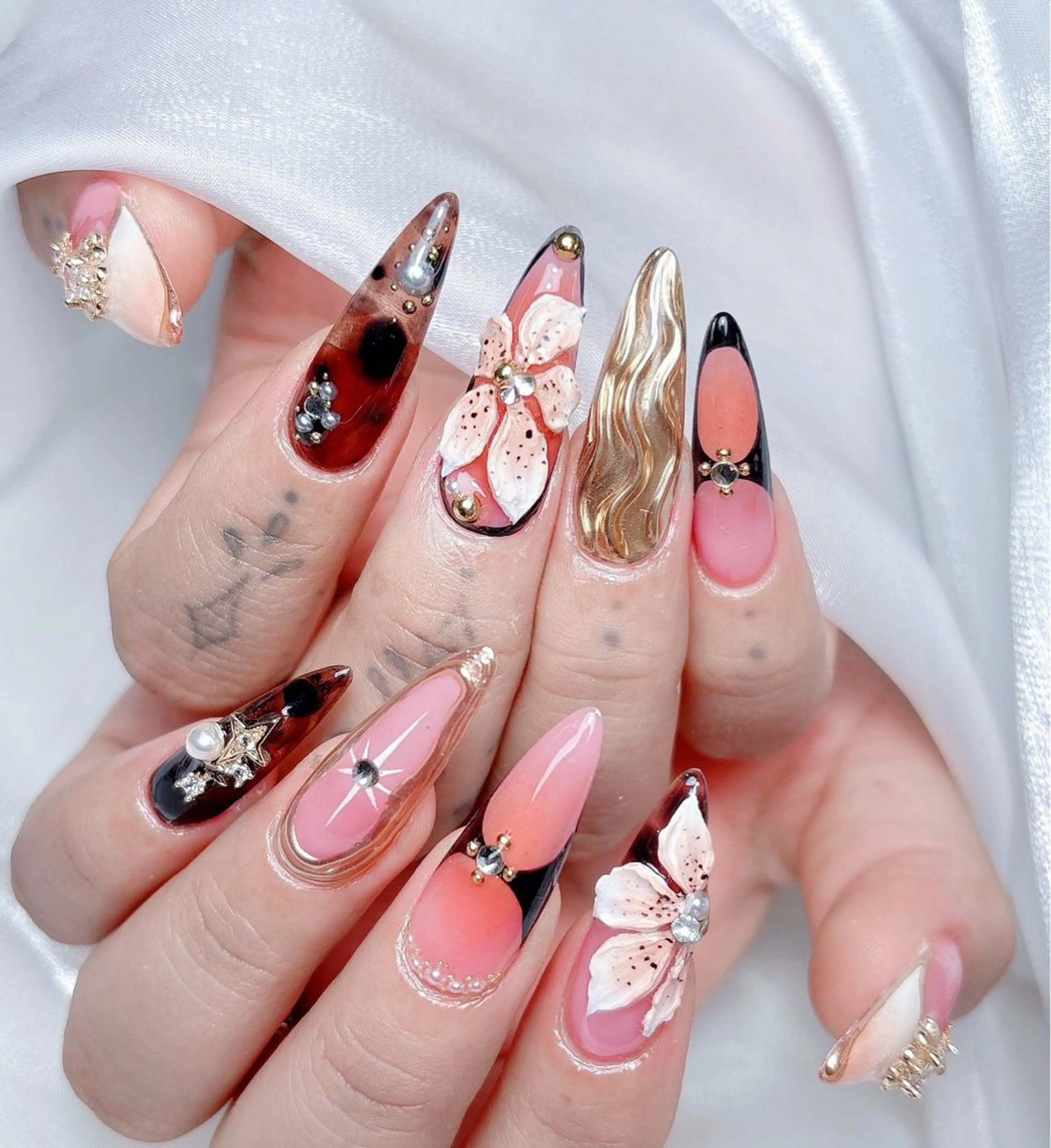 ネイル M🌷nail 長さだし専門店のネイルデザイン