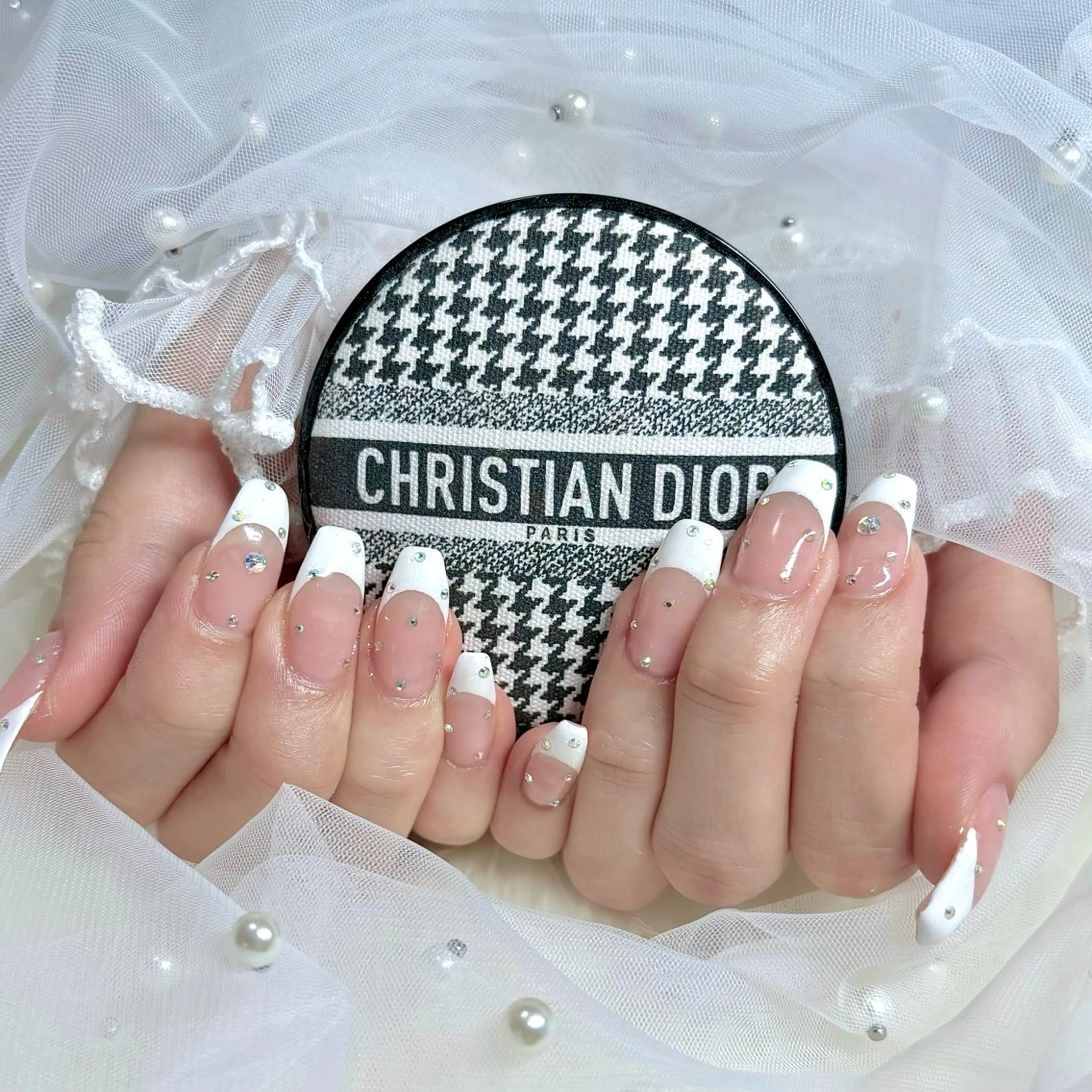 【ジェルオフ有】長さだし🎀グラデーション🤍の写真