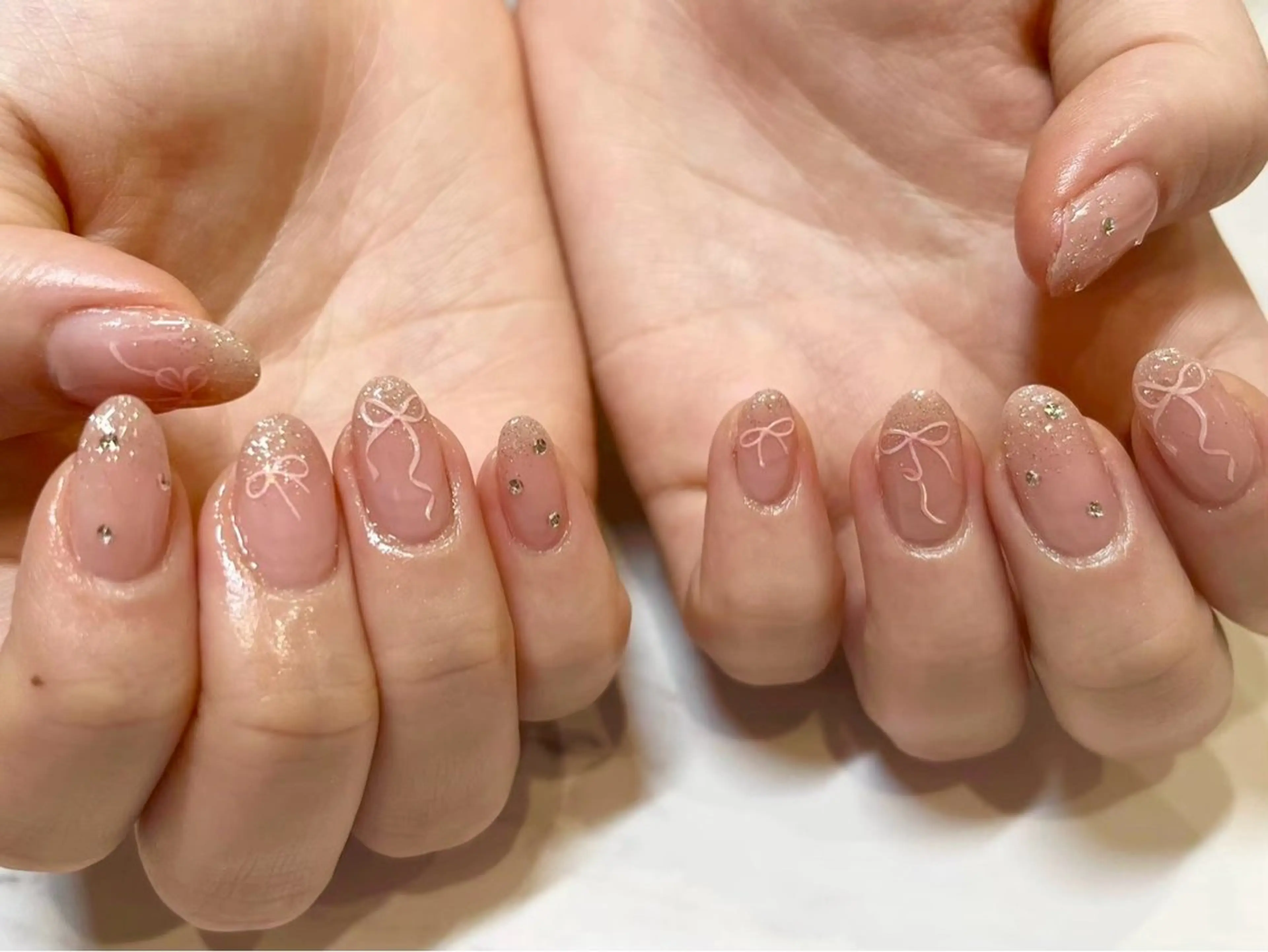 ネイル キラキラネイル ラメ(グリッター) リボン Ayano ♡のネイルデザイン