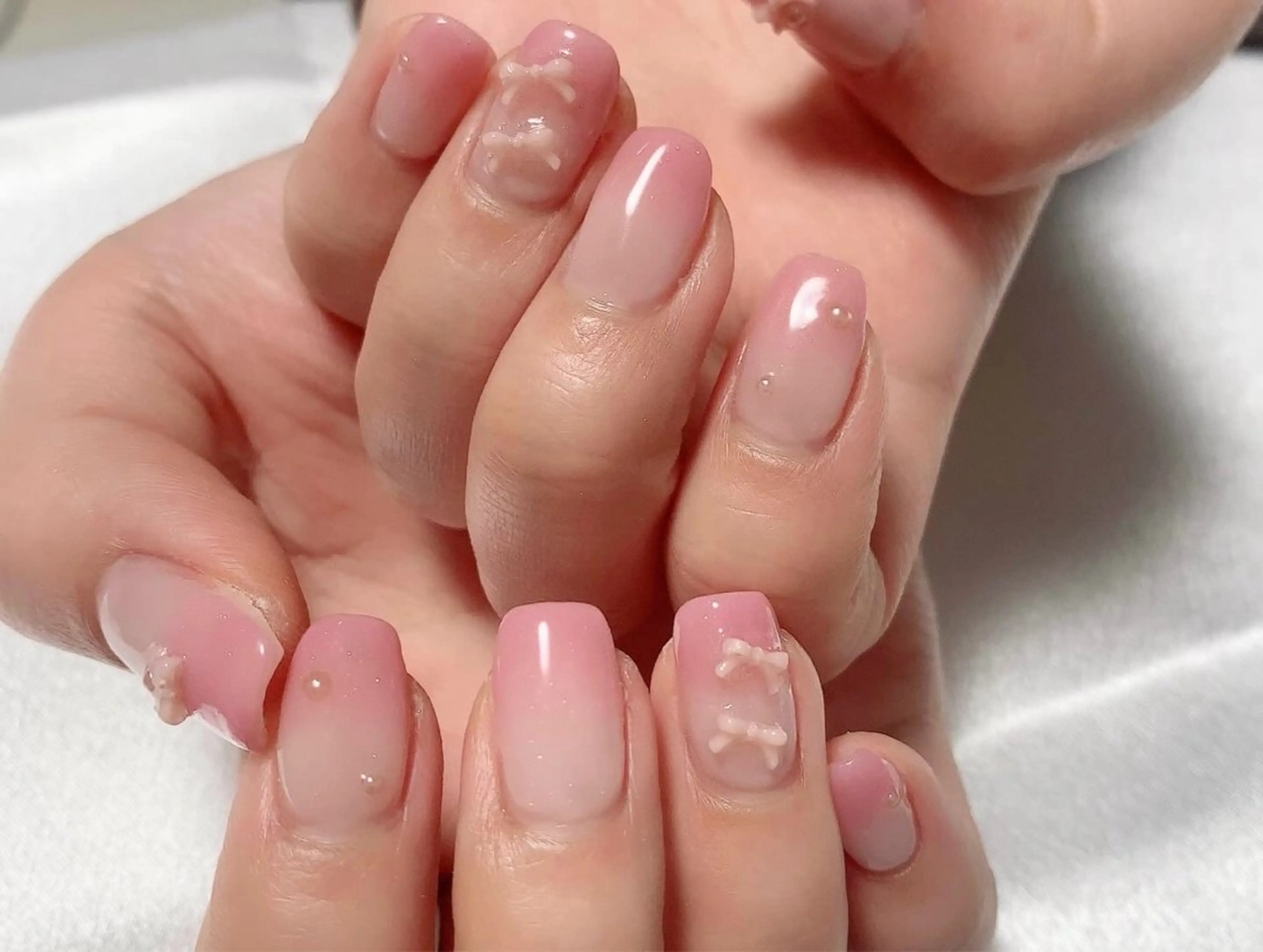 ネイル ガーリー グラデーション ピンク リボン nail lumièreのネイルデザイン