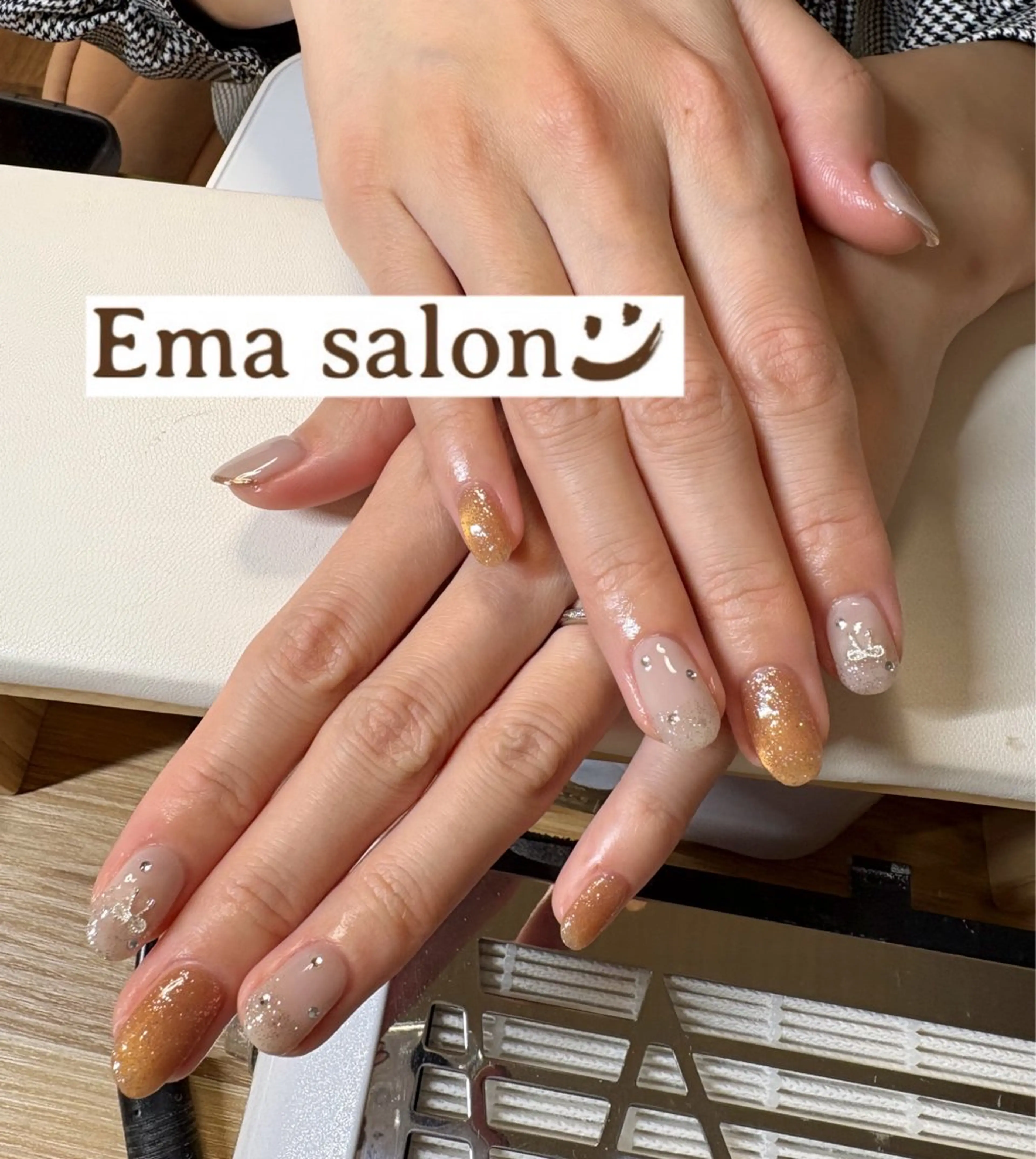 ネイル オレンジ ピンク リボン ハンドネイル Ema salon所属・Ema salon hiromiのネイルデザイン