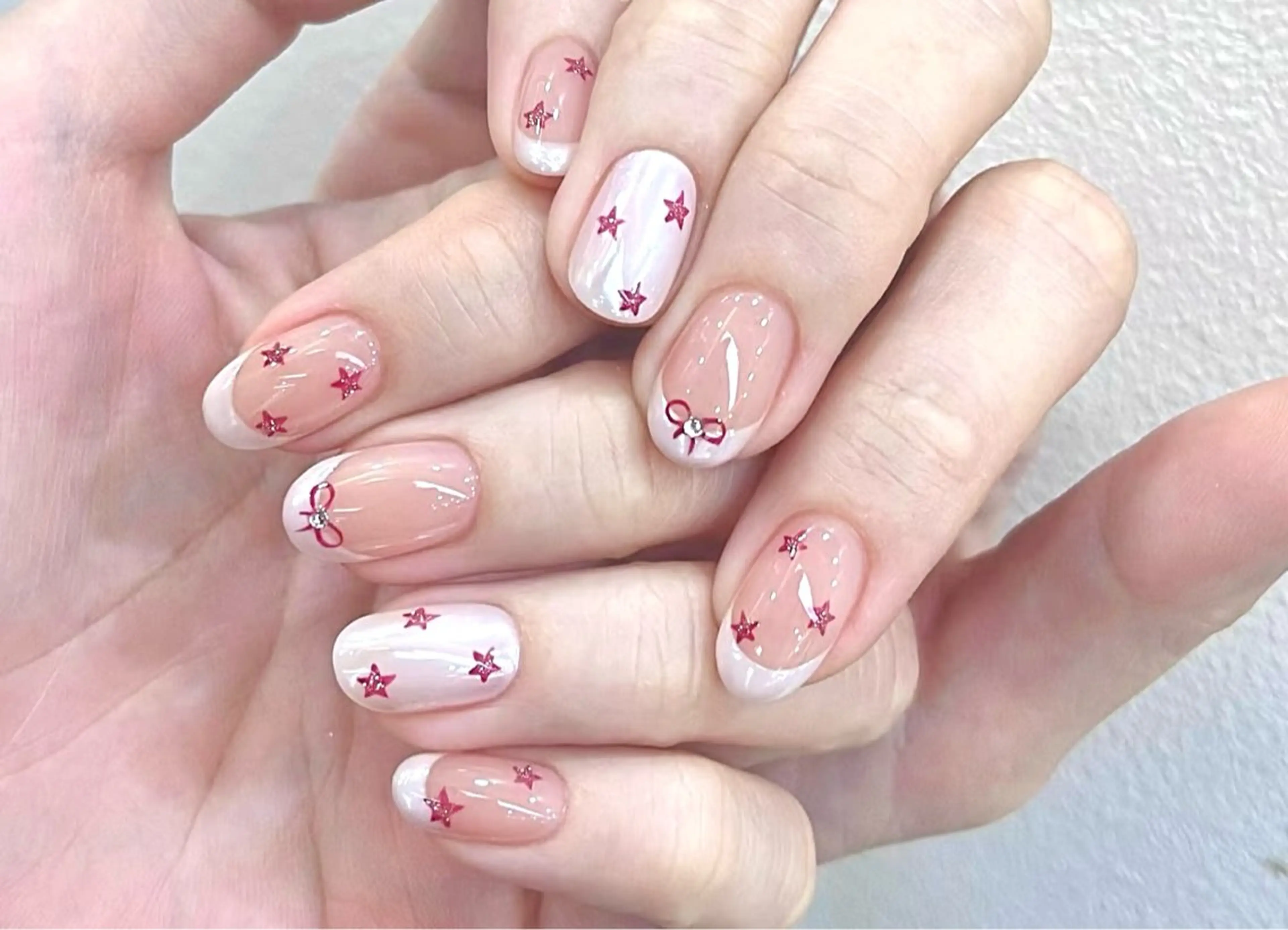 ネイル クリアネイル フレンチネイル ガーリー ピンク リボン ハンドネイル ハンドケア DarkHoney 池袋店のネイルデザイン