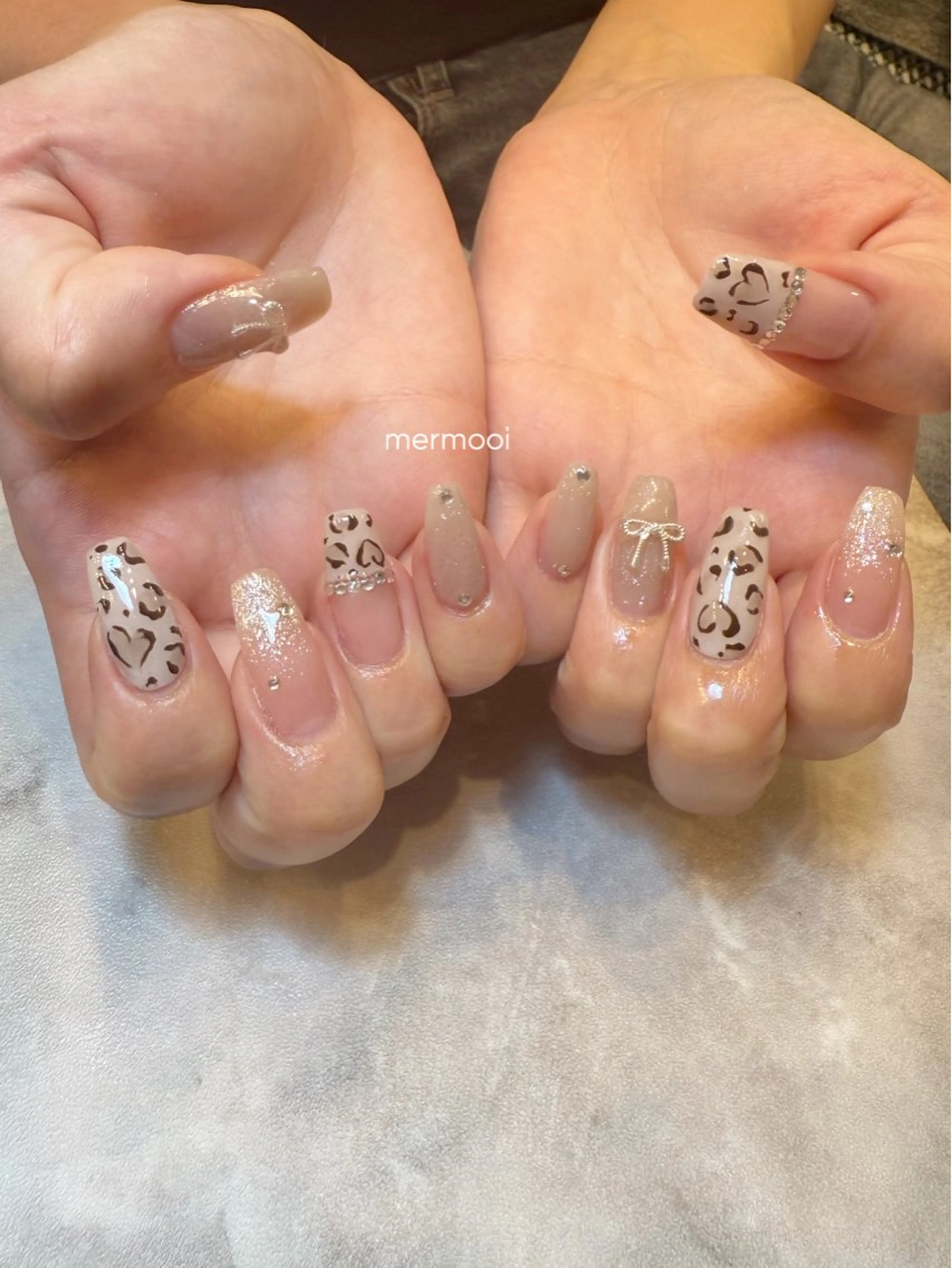 ネイル アニマル柄 ニュアンスネイル リボン ハンドネイル melu所属・melu yukikoのネイルデザイン