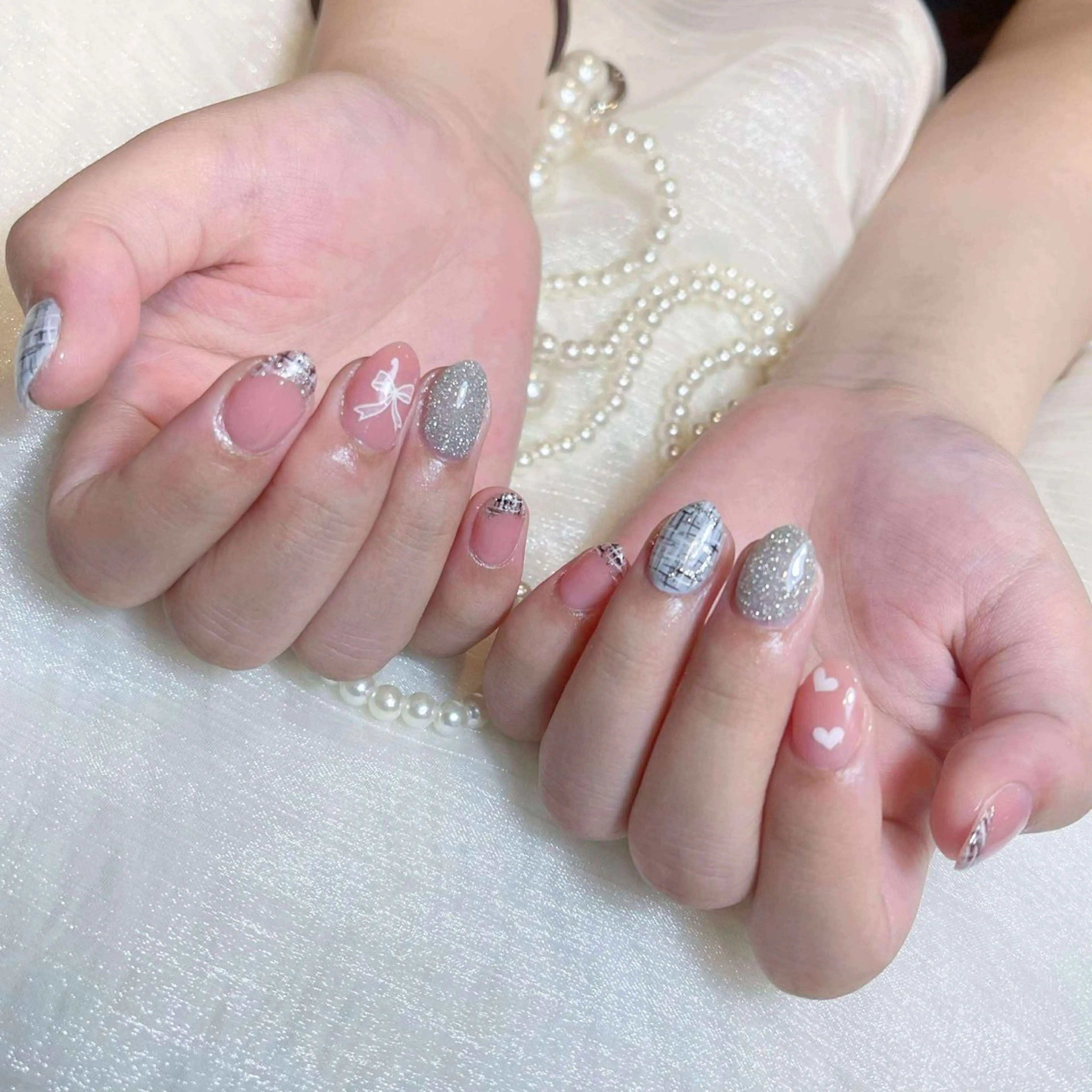 ミディアム タオ タオ Nailのネイルデザイン