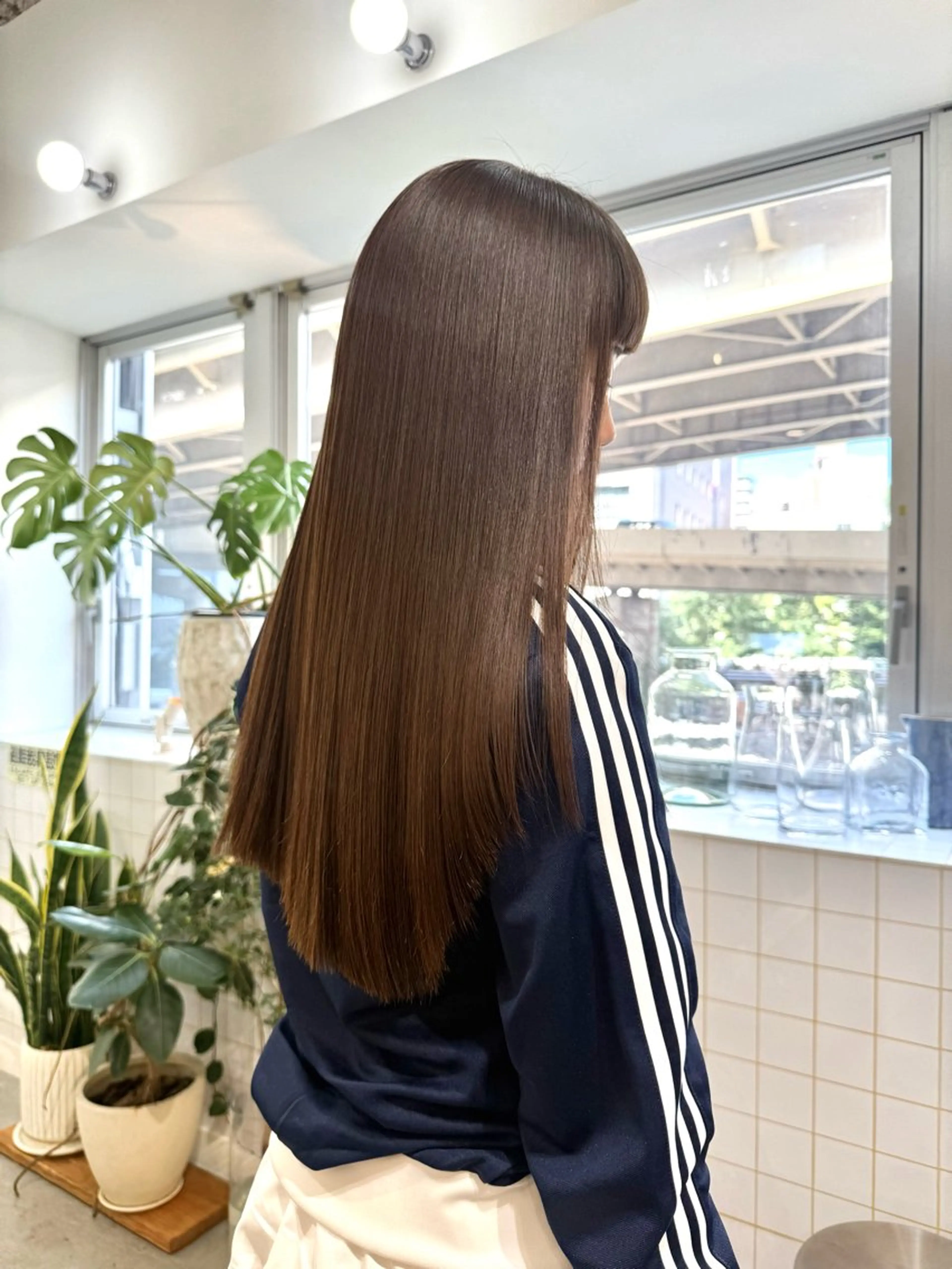 ロング ダメージレスの縮毛 矯正ブリーチMICOのヘアスタイル