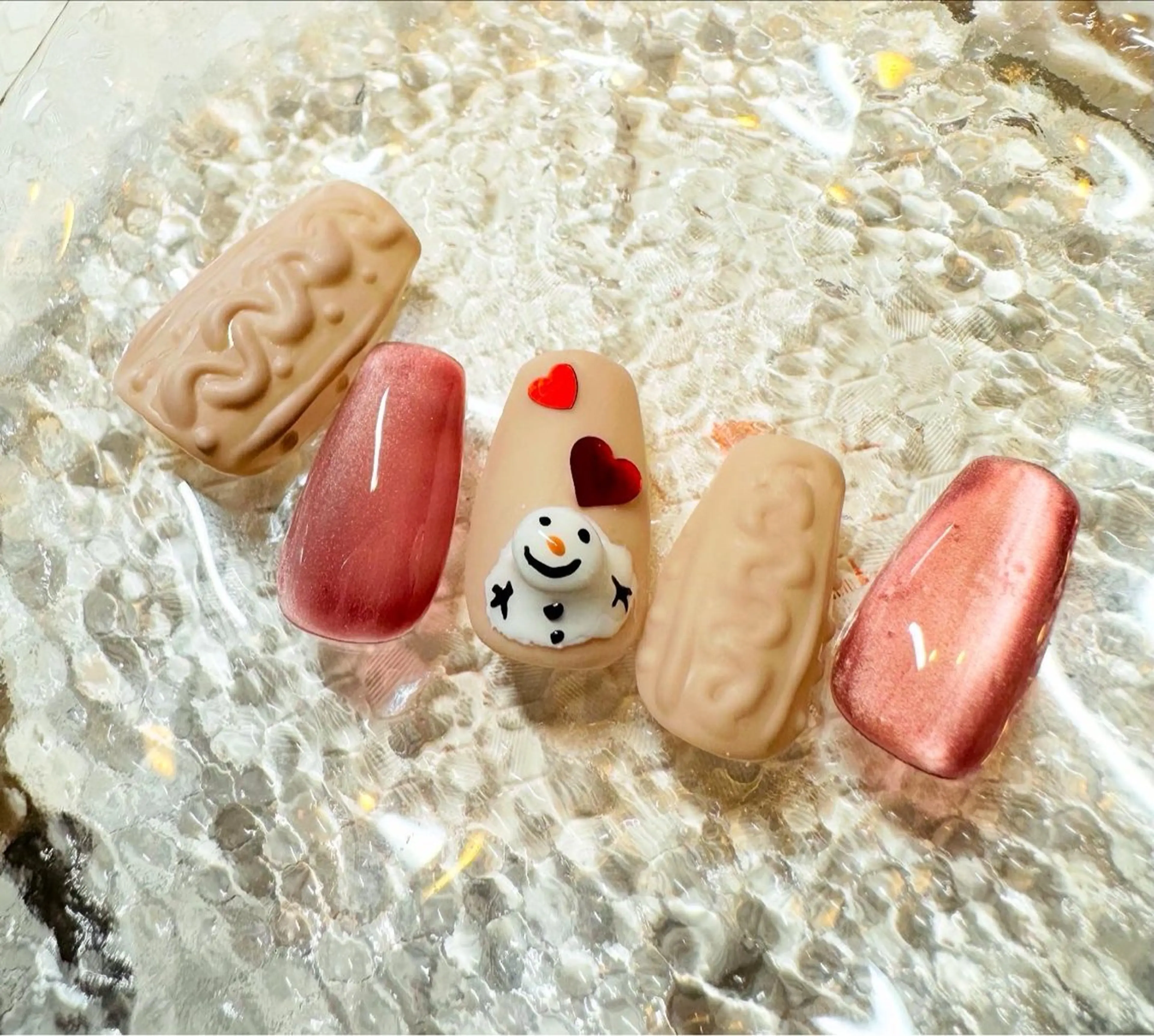 ネイル リボン ストーンネイル 冬ネイル ハンドネイル ネイルサロンエレノア所属・田端 笑理菜のネイルデザイン