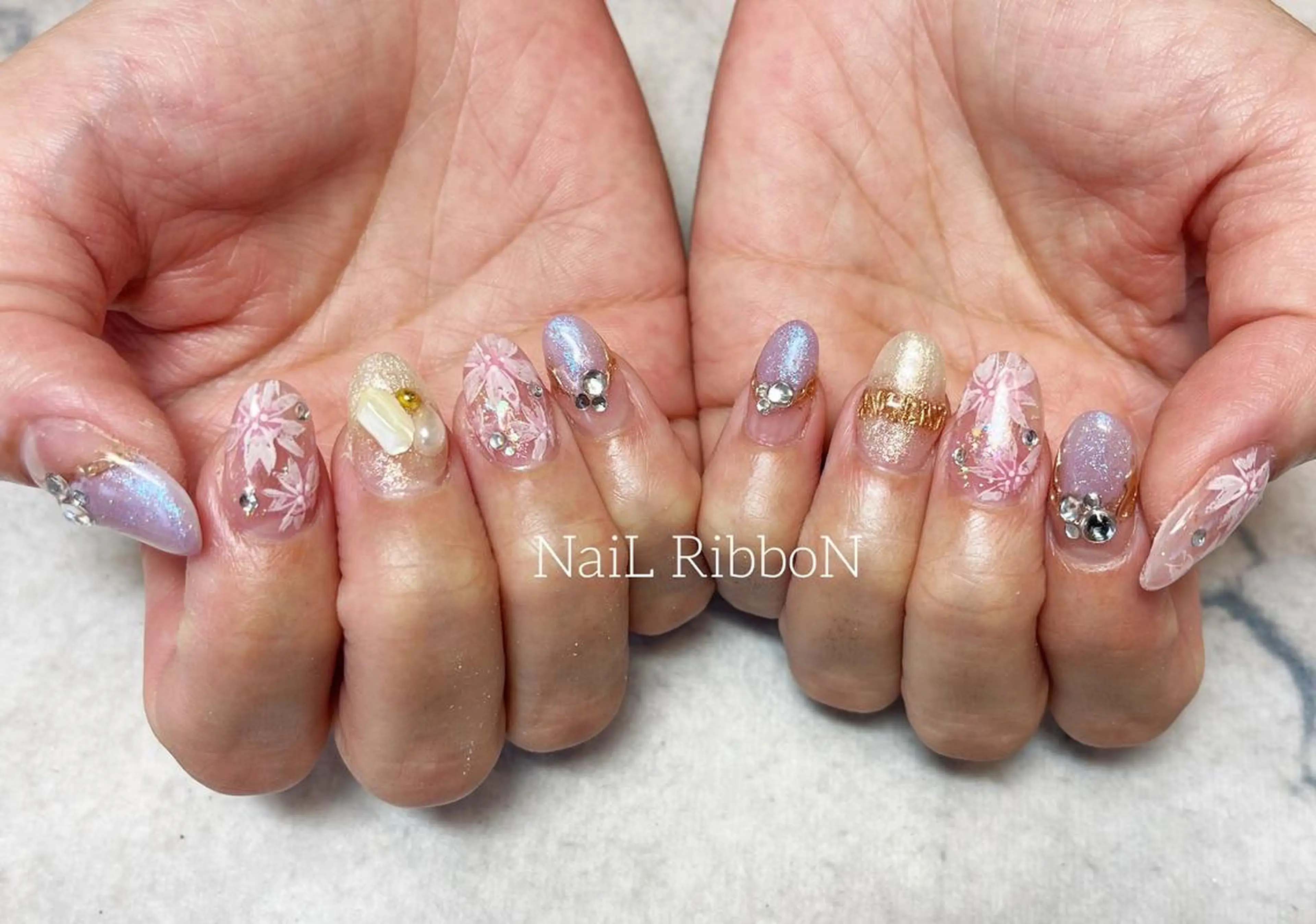 ネイル ネイルリボン 受付スタッフのネイルデザイン