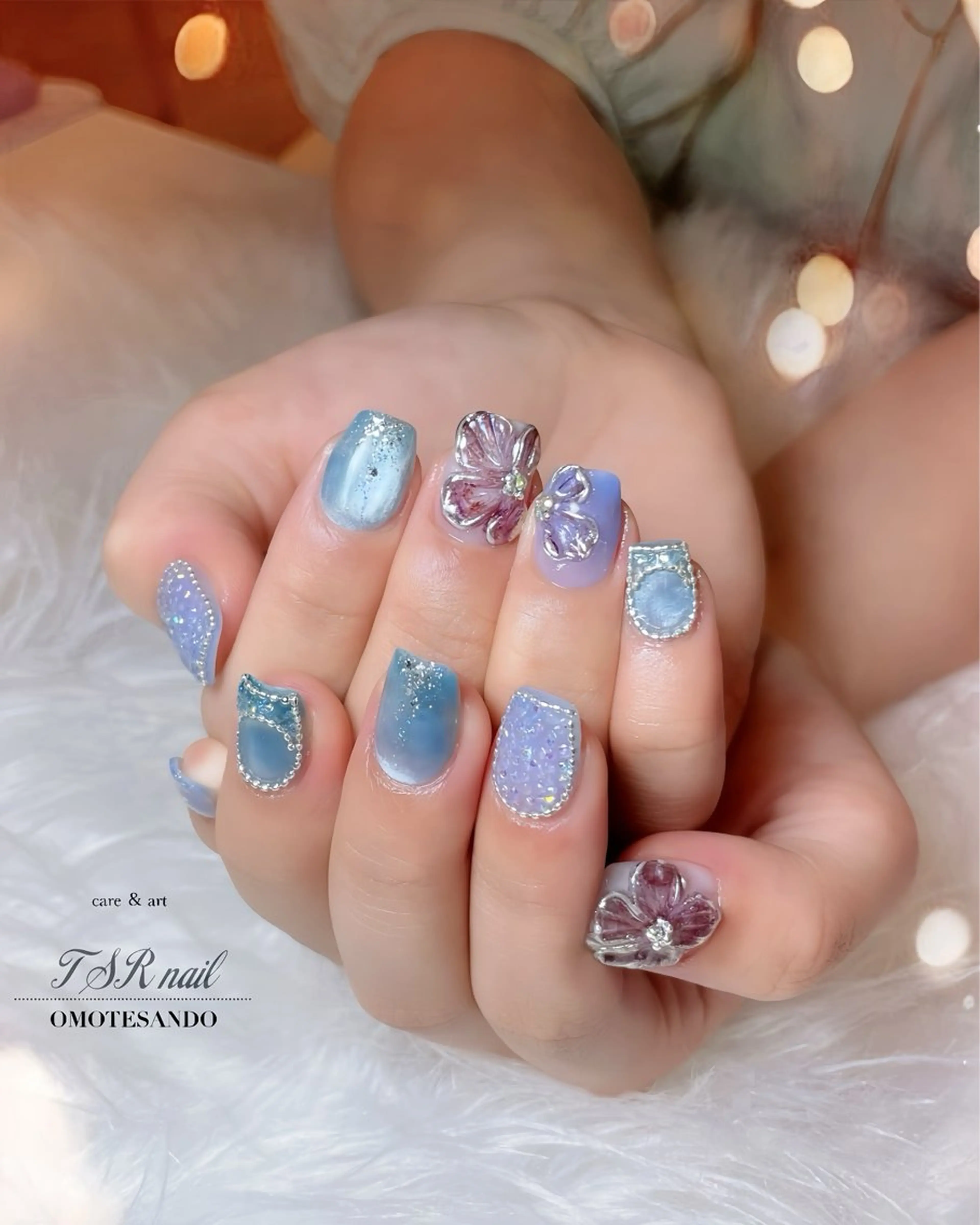 ネイル アートネイル ブルー 桜ネイル フラワーネイル ぷっくりネイル ハンドネイル ハンドケア 爪咲 りり花のネイルデザイン