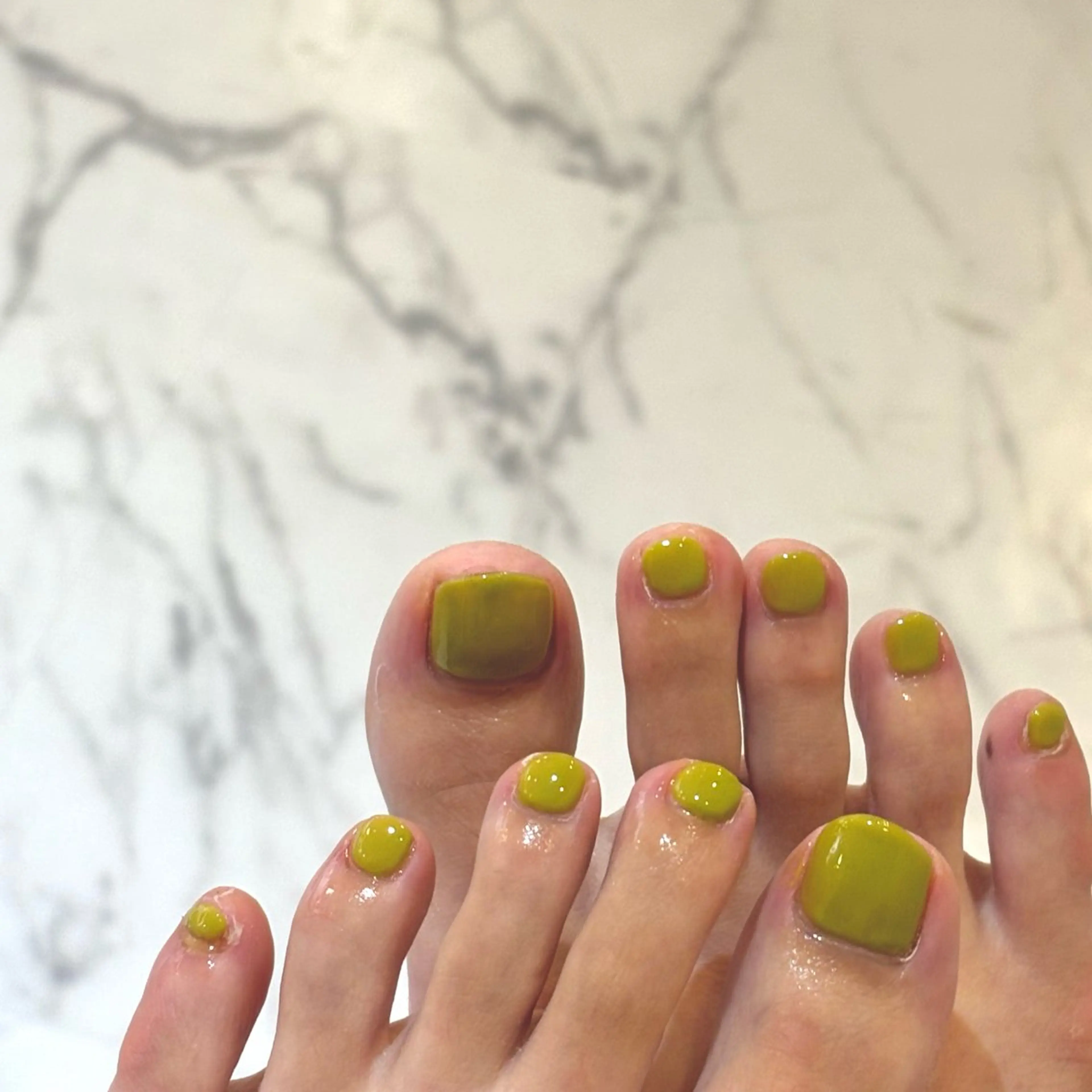 フットワンカラー💚ネイルモデルクーポンの写真