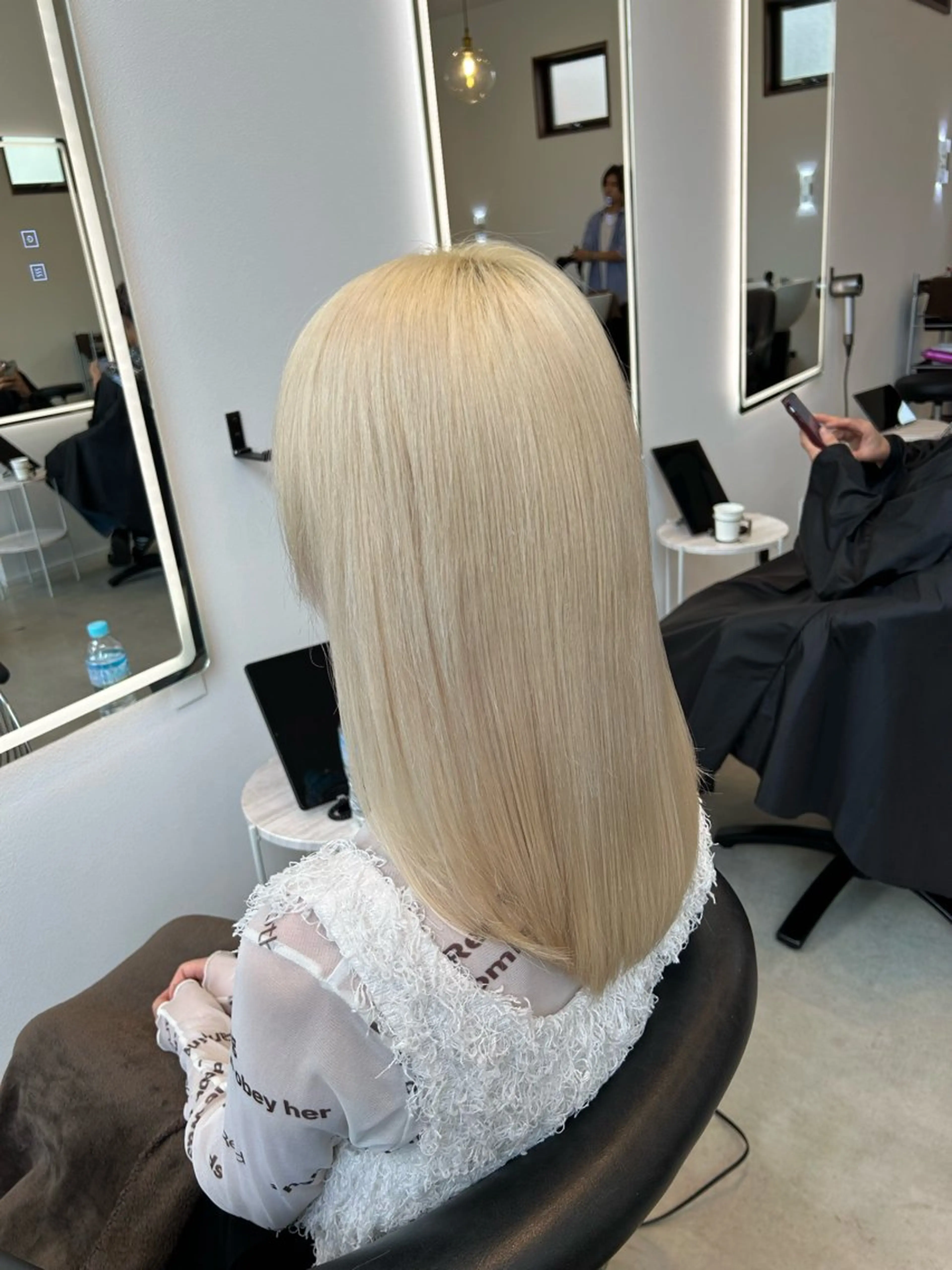 ロング QUON.伊勢崎店所属・ブリーチ＆ハイトーン 歌 心のヘアスタイル