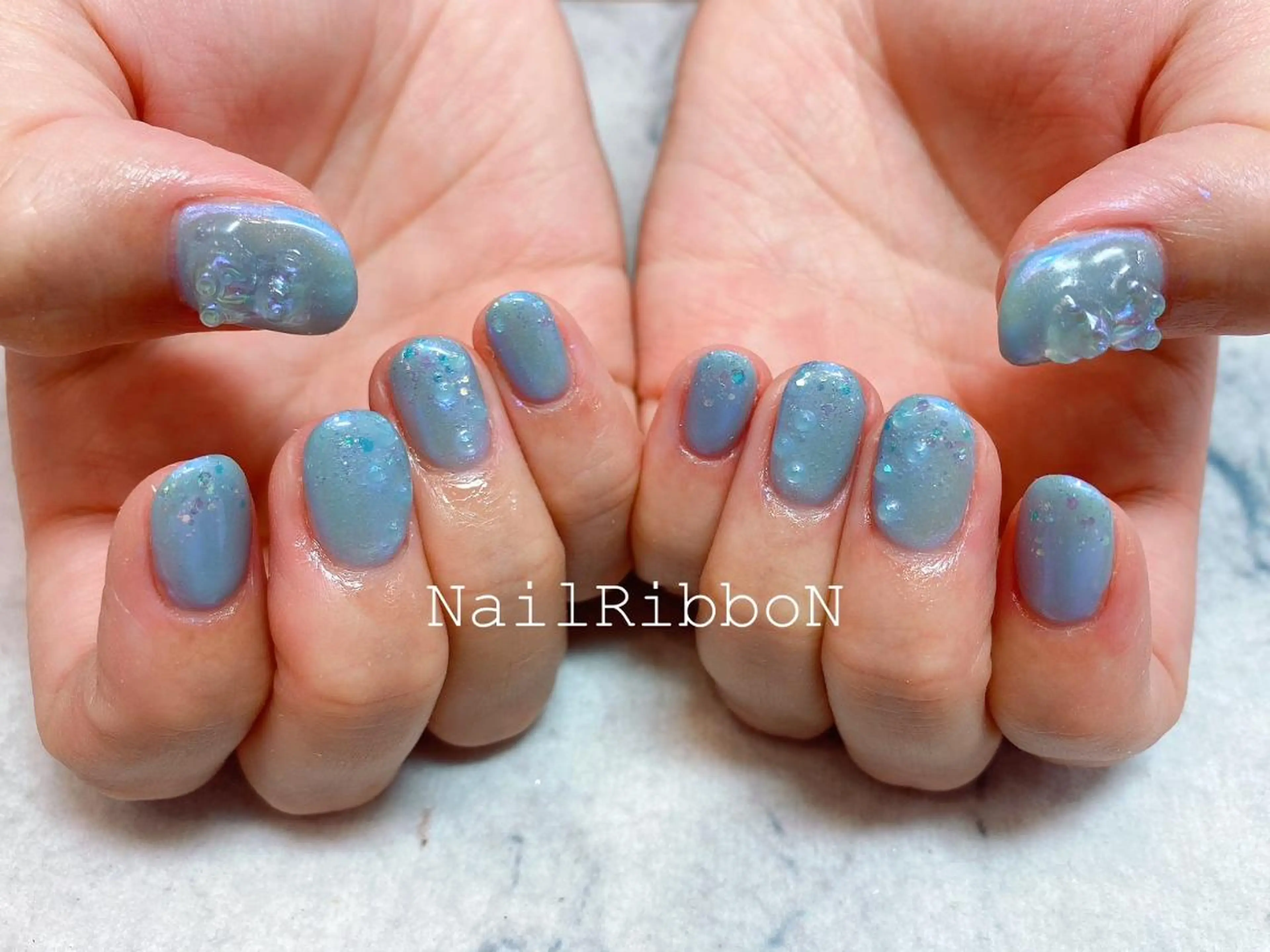 ネイル ネイルリボン 受付スタッフのネイルデザイン