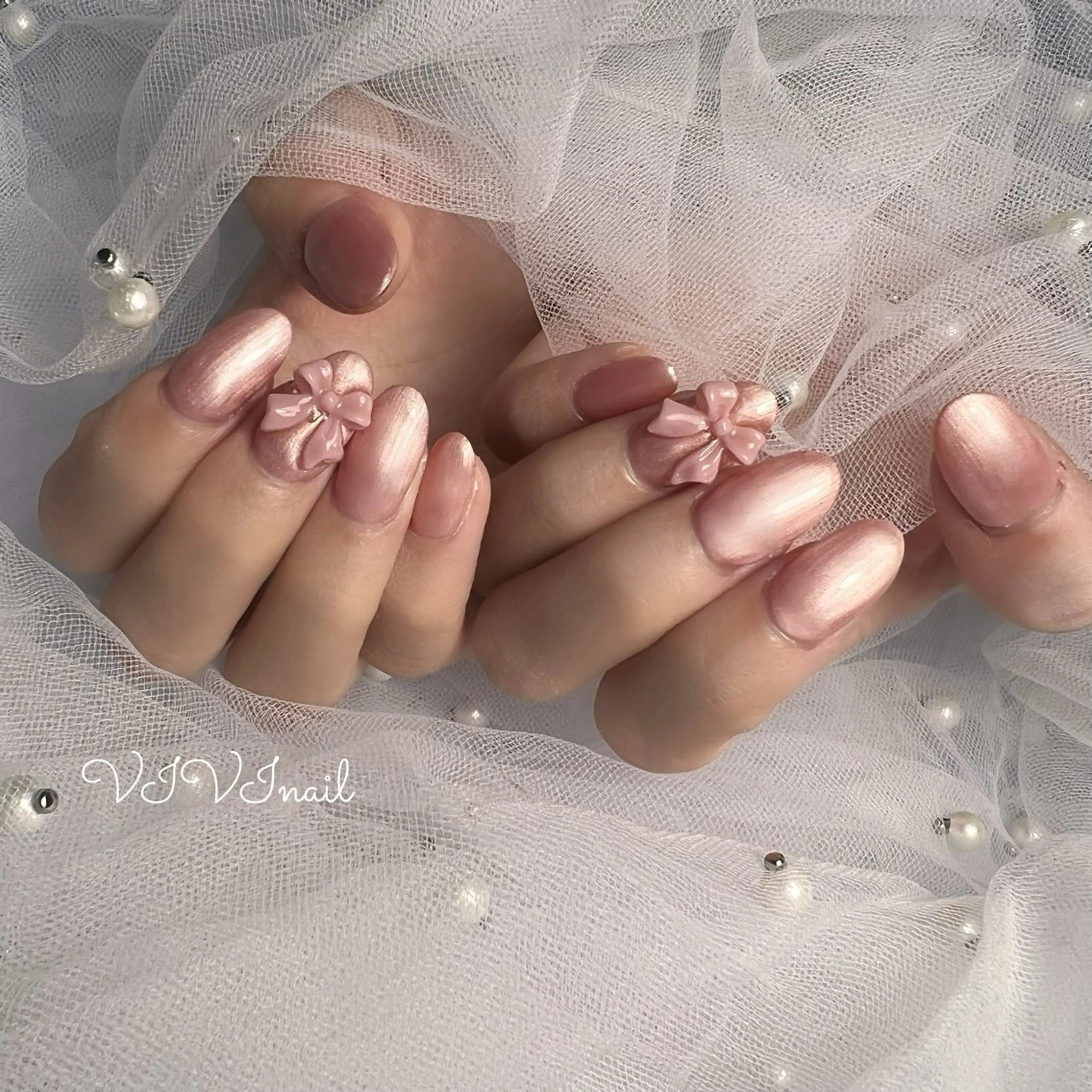 ネイル ワンカラーネイル ピンク リボン ハンドネイル vivi nailのネイルデザイン