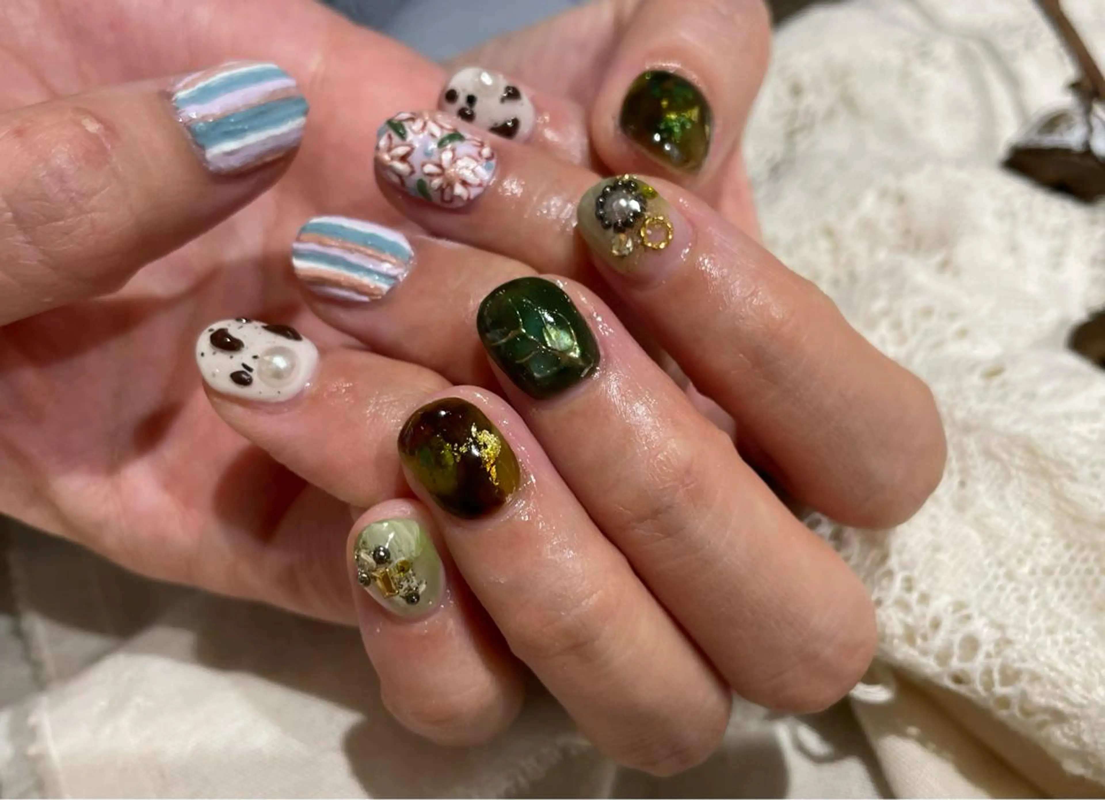 ショート m kaori𓃟のネイルデザイン