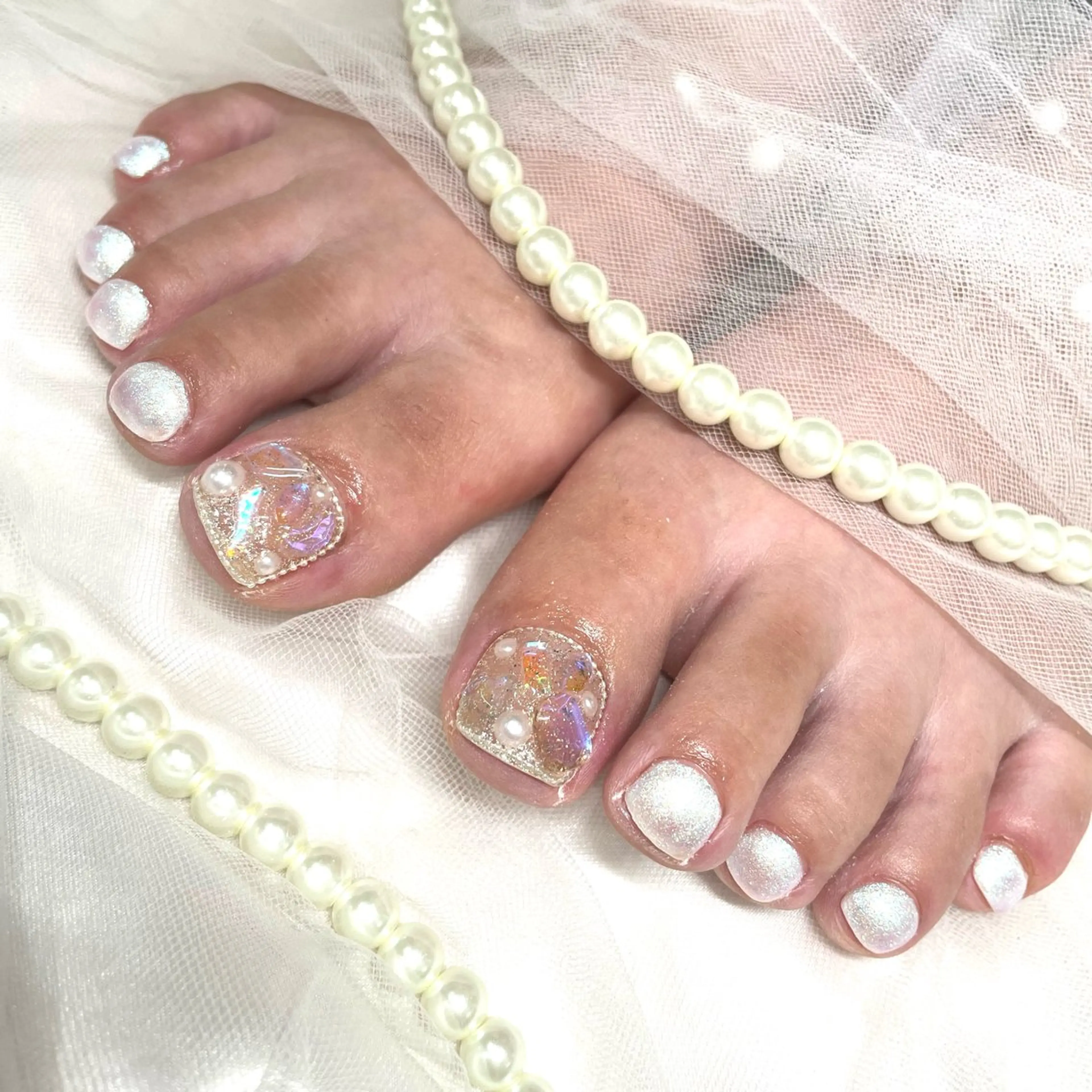 フットネイル💟親指アート🤍オフあり❣️の写真