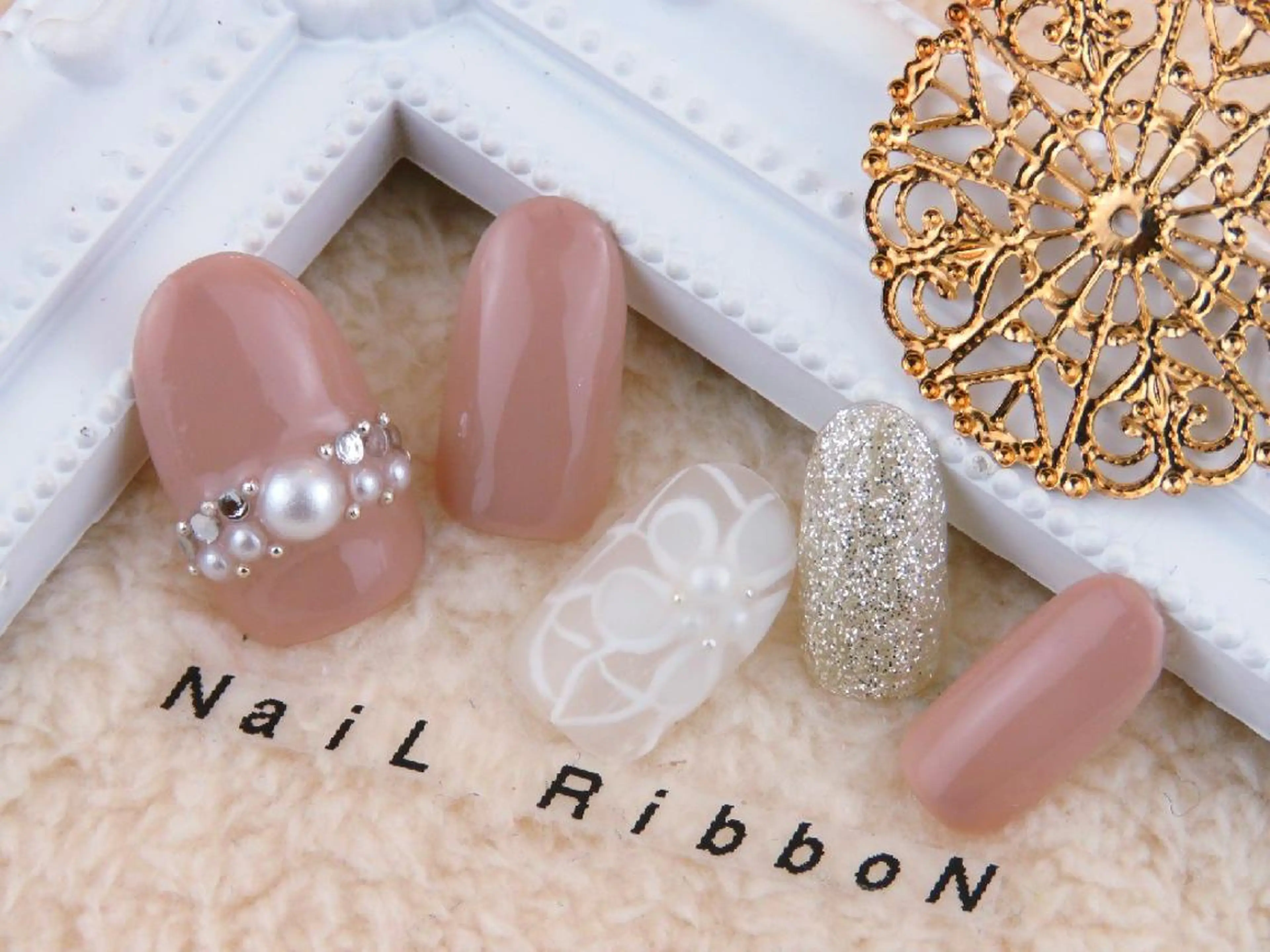 ネイル ネイルリボン 受付スタッフのネイルデザイン