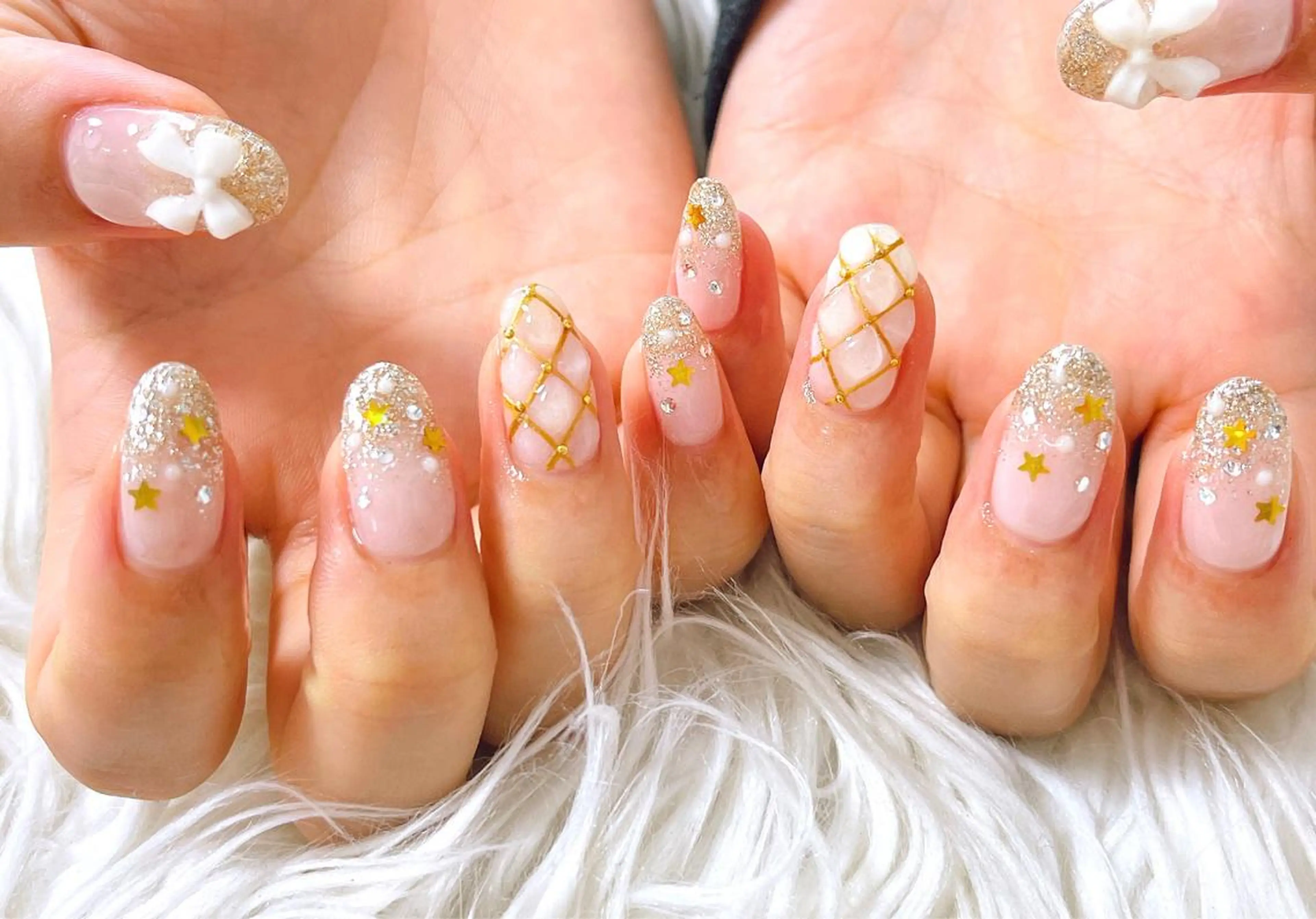 ネイル リボン celica所属・松田 由真のネイルデザイン