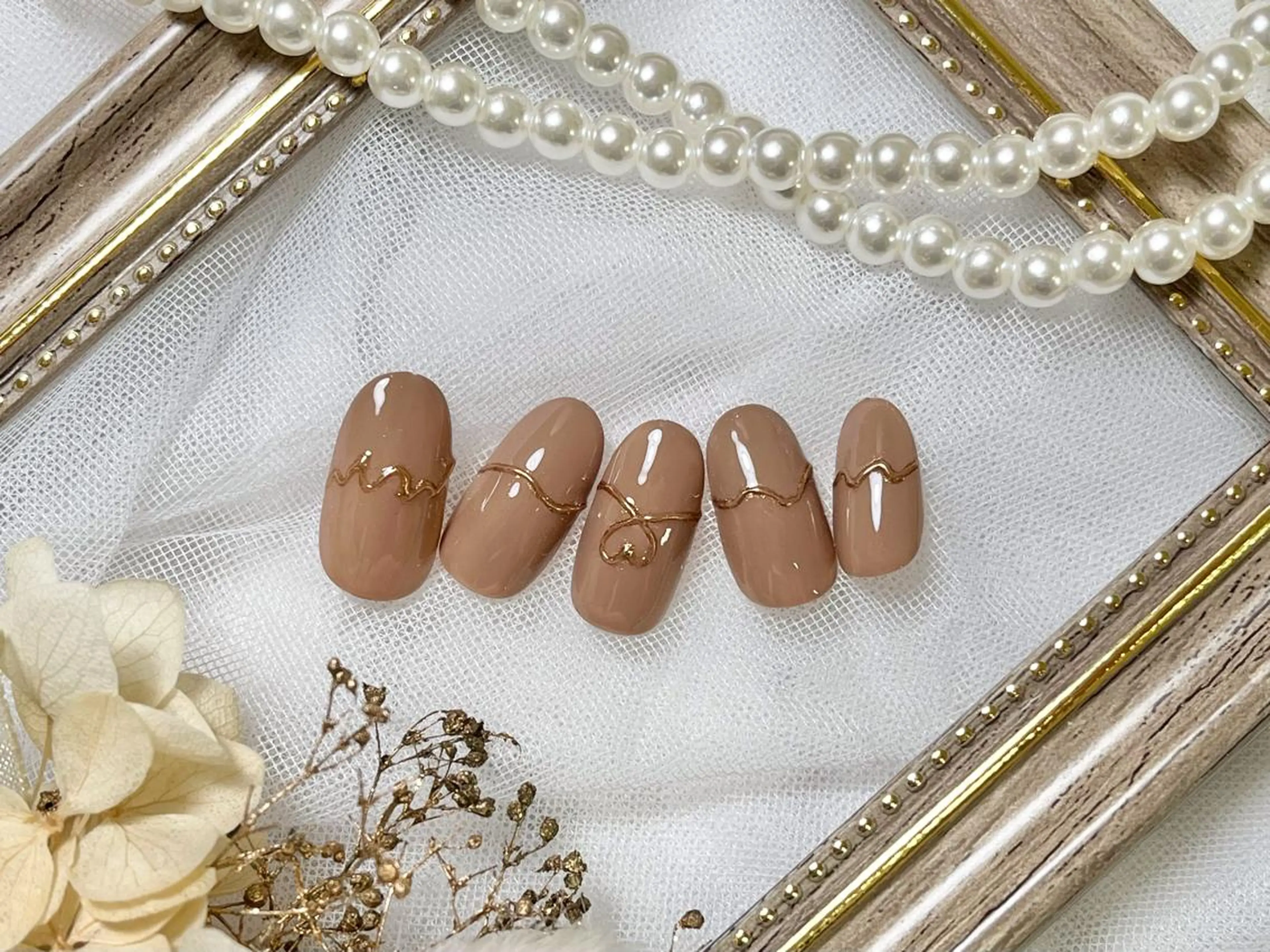 ネイル ハンドネイル ネイルPetit Ribbonのネイルデザイン