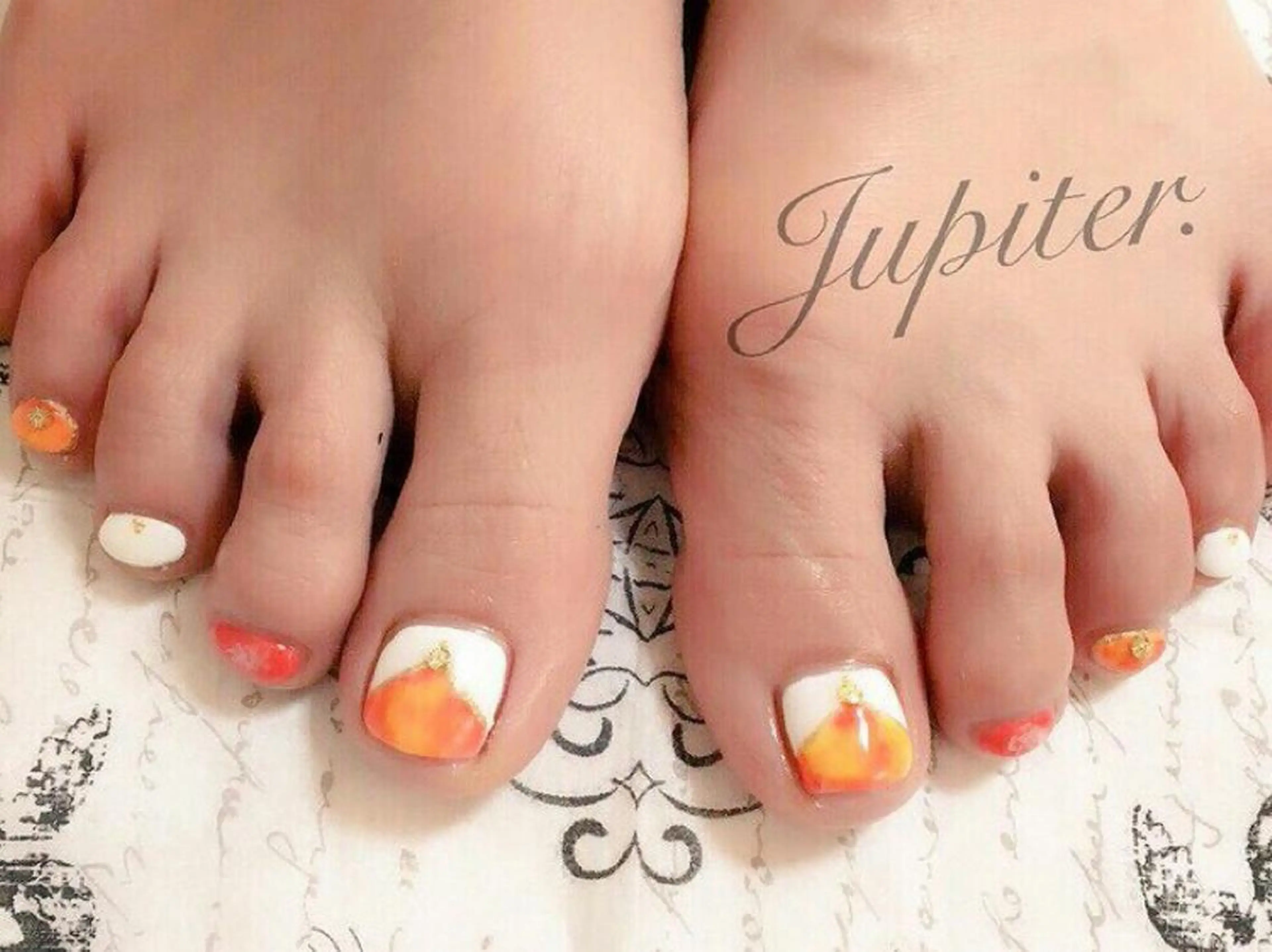 ネイル 大理石ネイル(マーブル) オレンジ 夏ネイル フットネイル PrivateSalon Jupiter所属・Jupiter .のネイルデザイン
