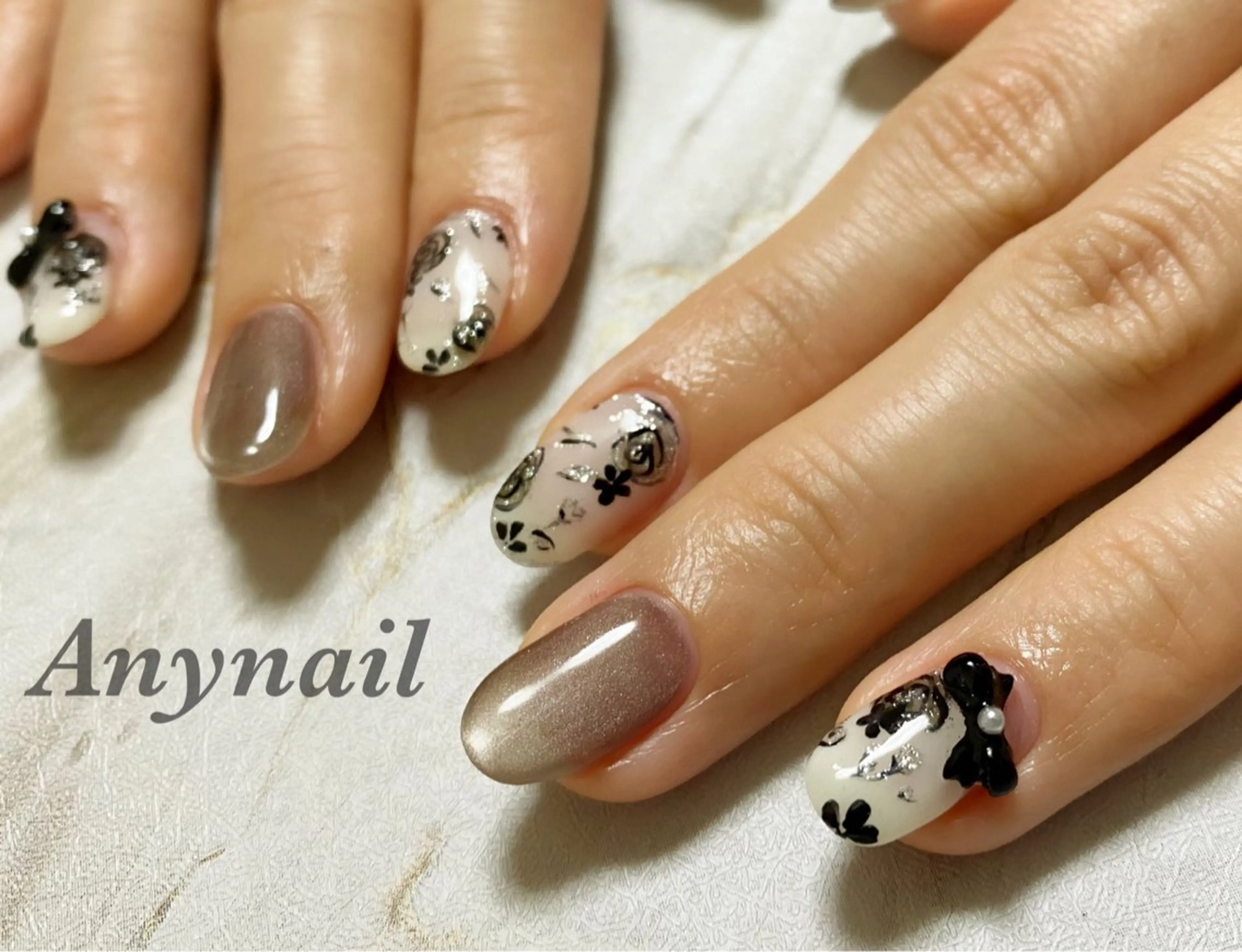 ネイル ブルー フラワーネイル マグネットネイル リボン 岩澤 恵子のネイルデザイン